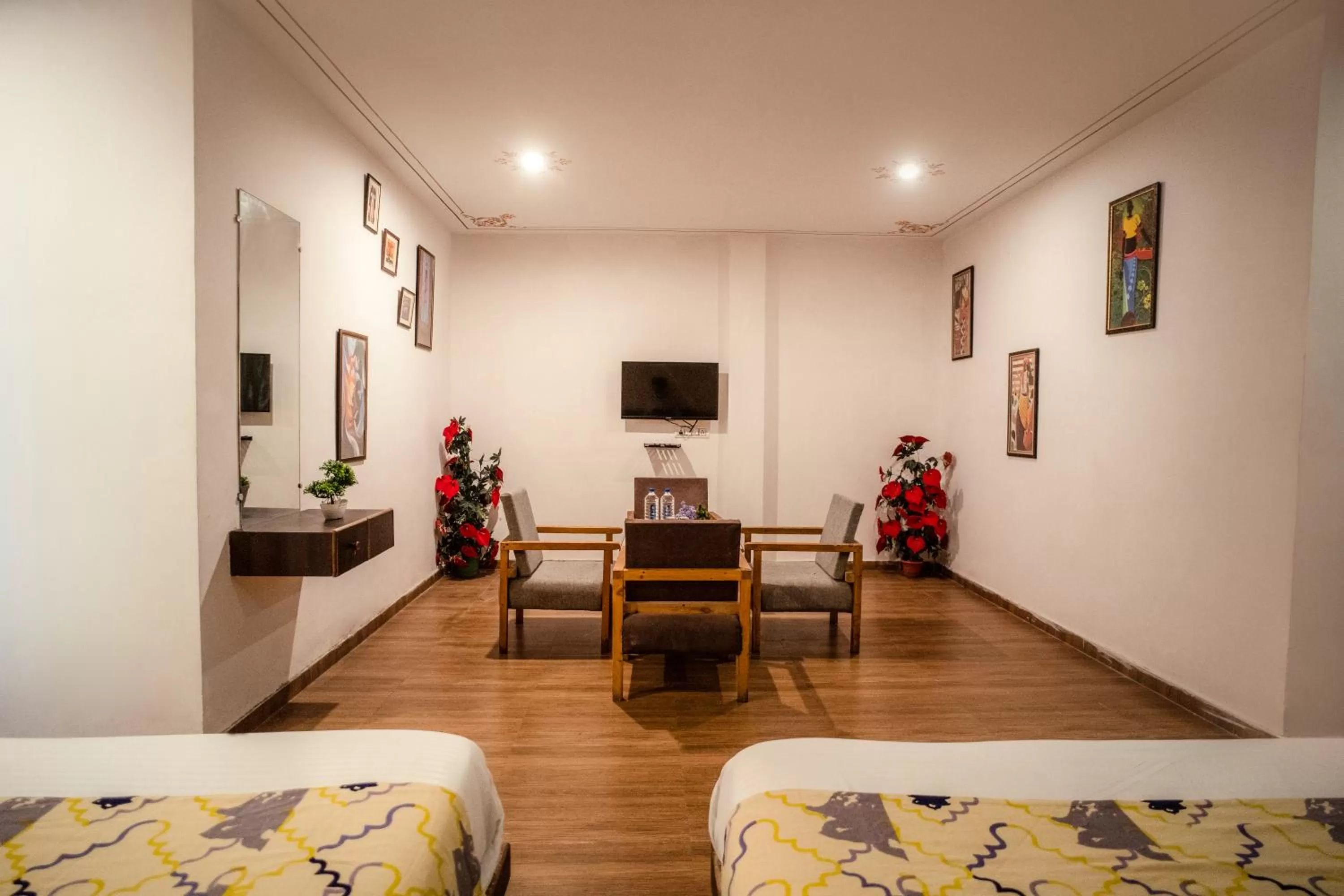 Living room, Bed in Tripli Hotels Arunoday Palace