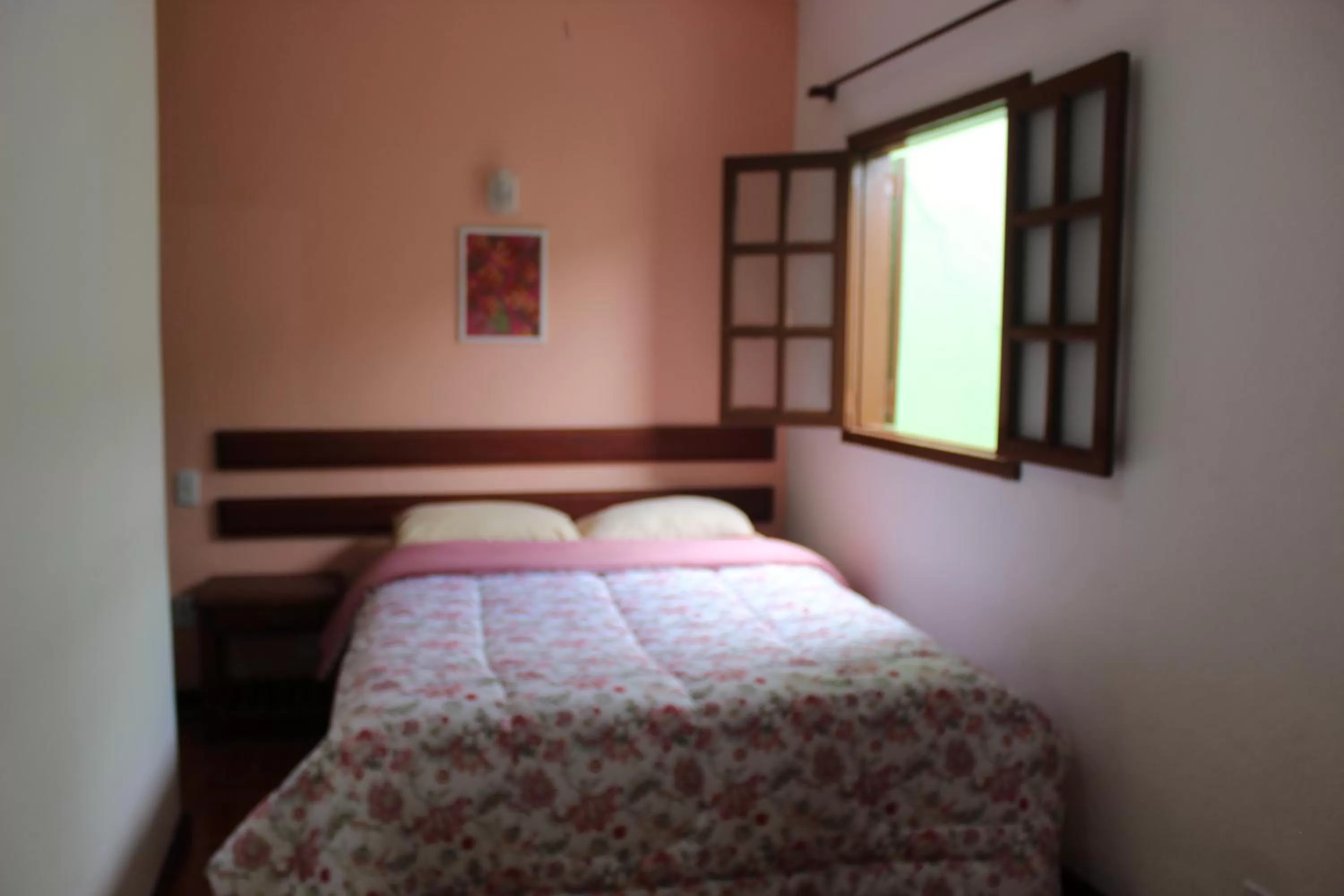 Bed in Pousada Flor de Paraty