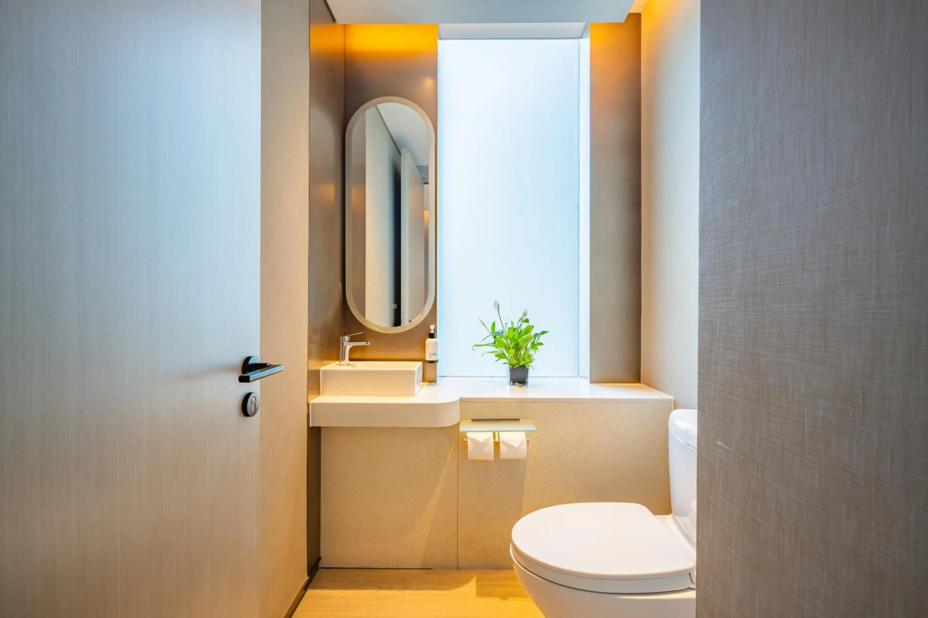 Toilet in EVEN Hotels Shanghai Expo by IHG