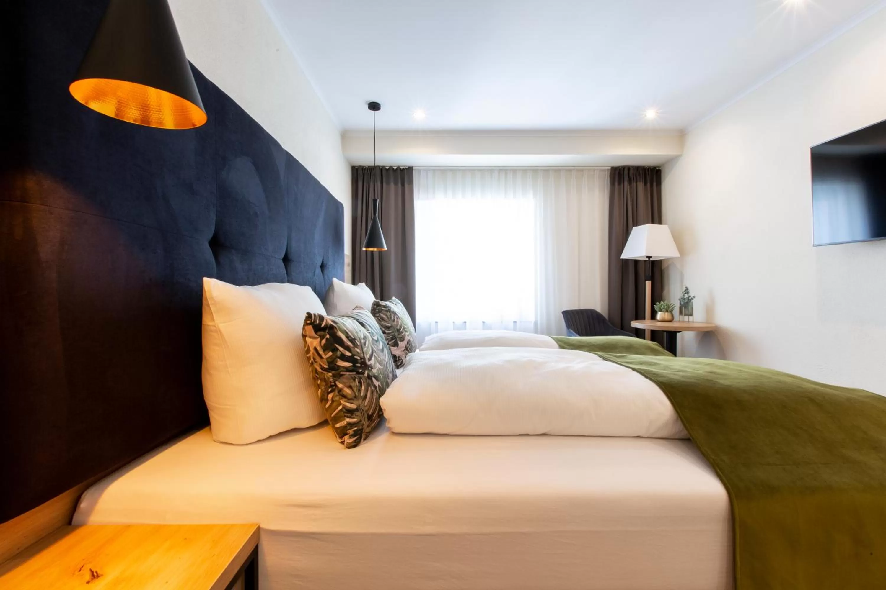 Bed in Stadthotel Lichtenfels