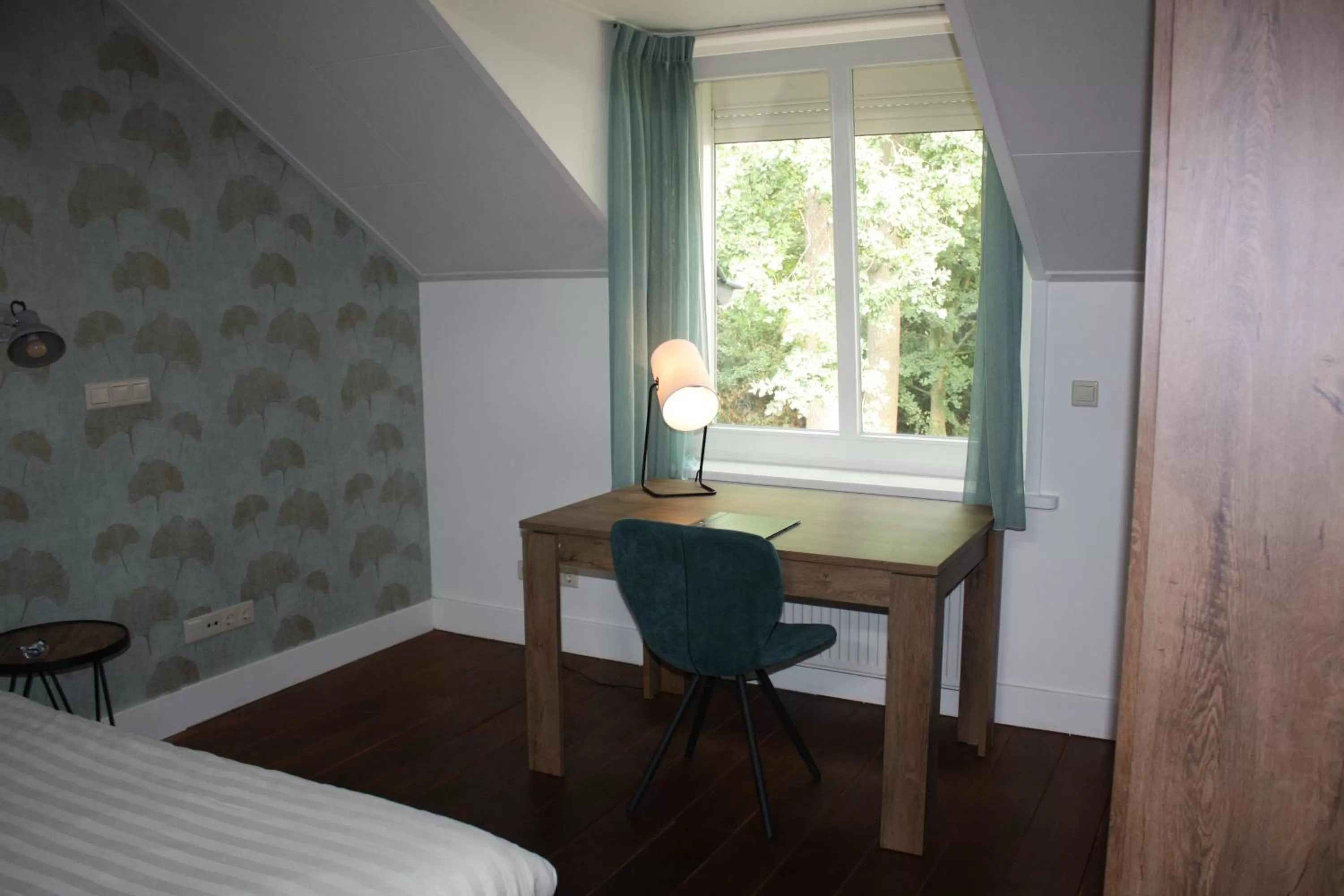 Living room, Bed in Hotel De Hoefpoort