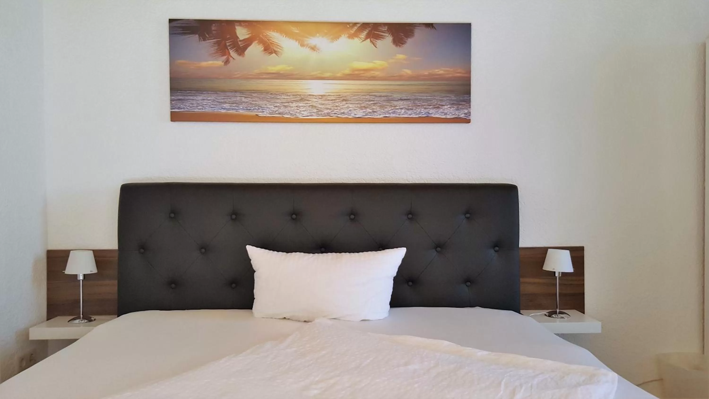 Bed in Hotel Exquisite