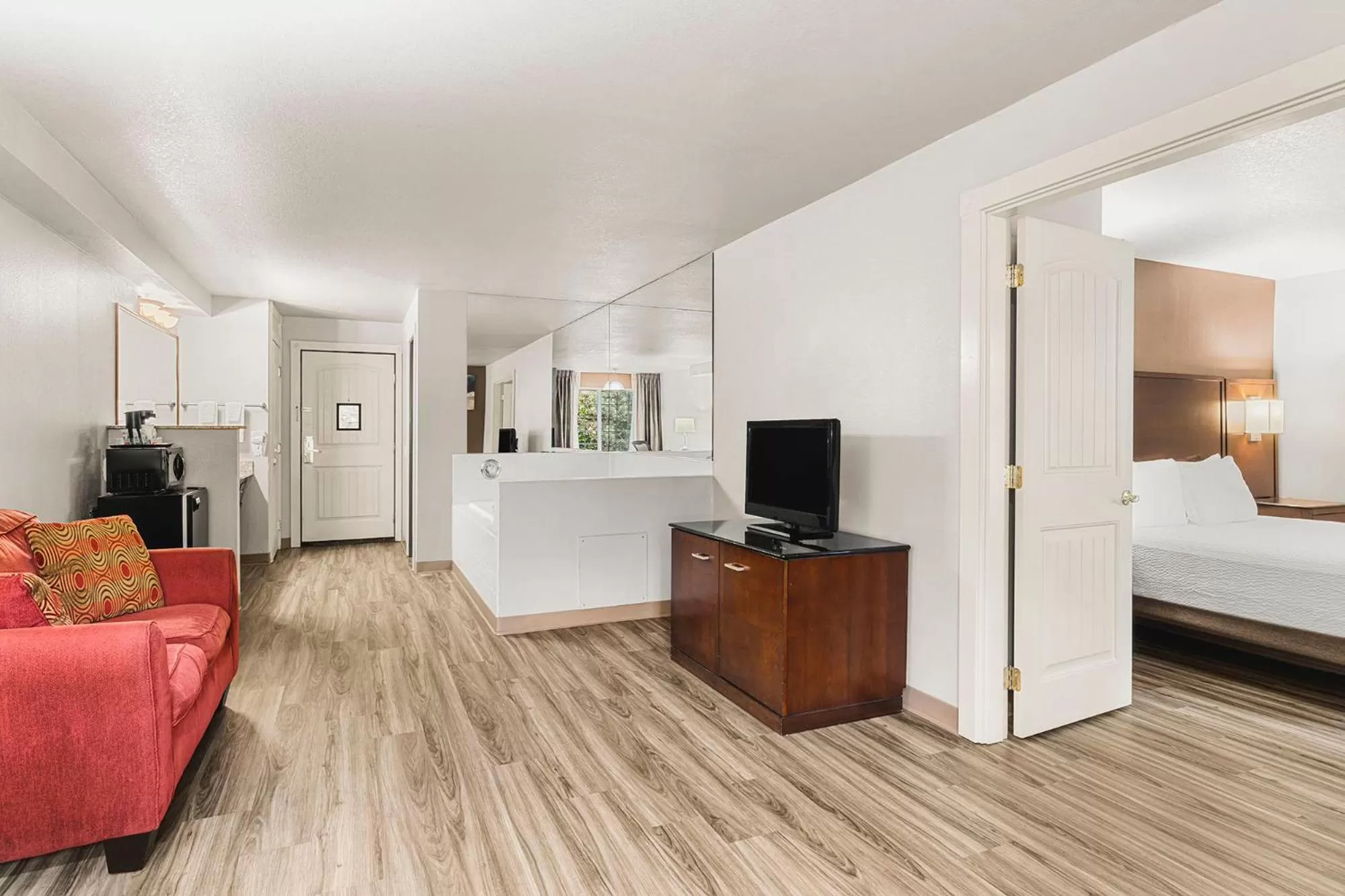 Bed in The Ashley Inn & Suites