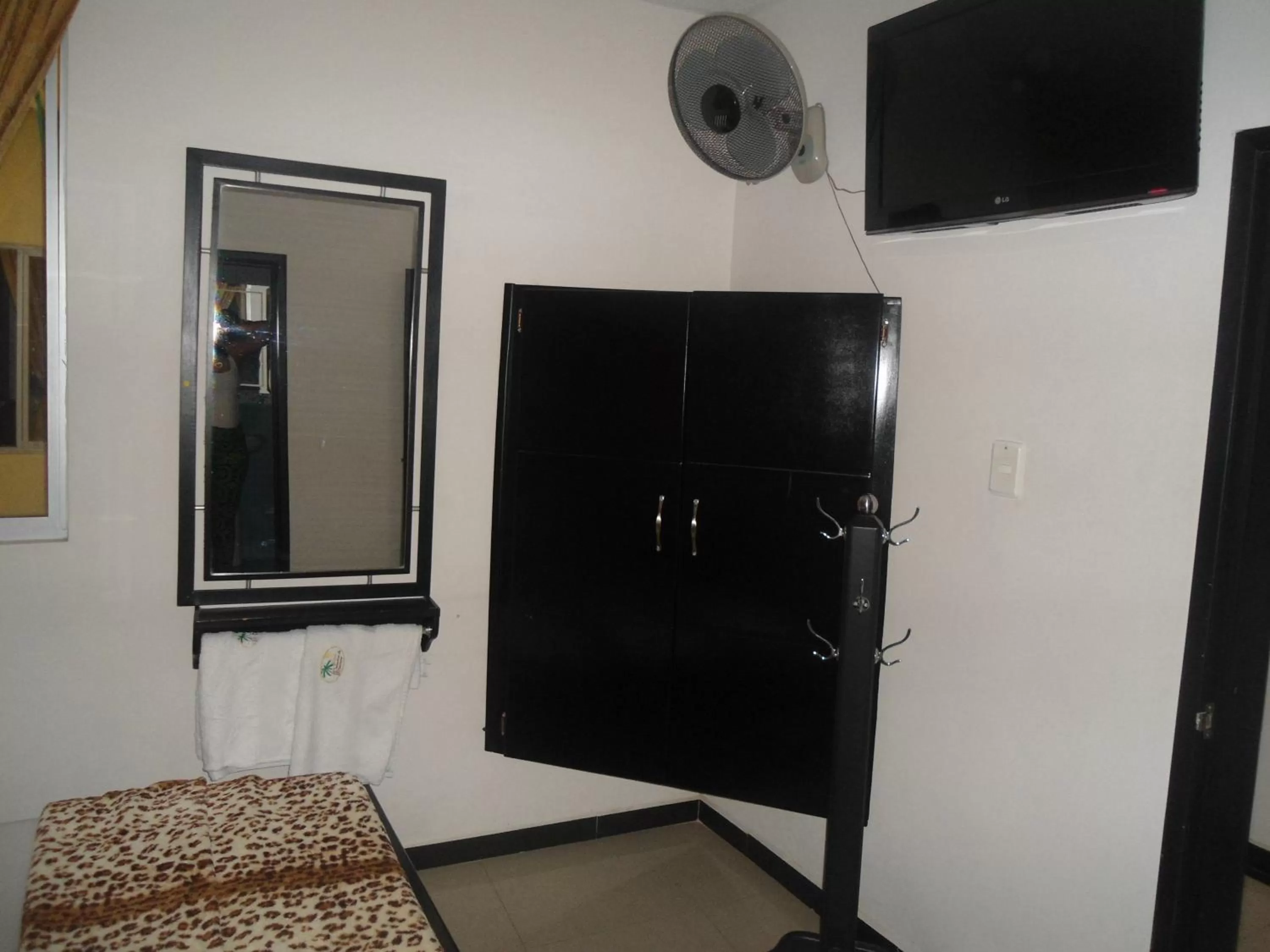 TV and multimedia, TV/Entertainment Center in Hotel Palmeras De Mariana