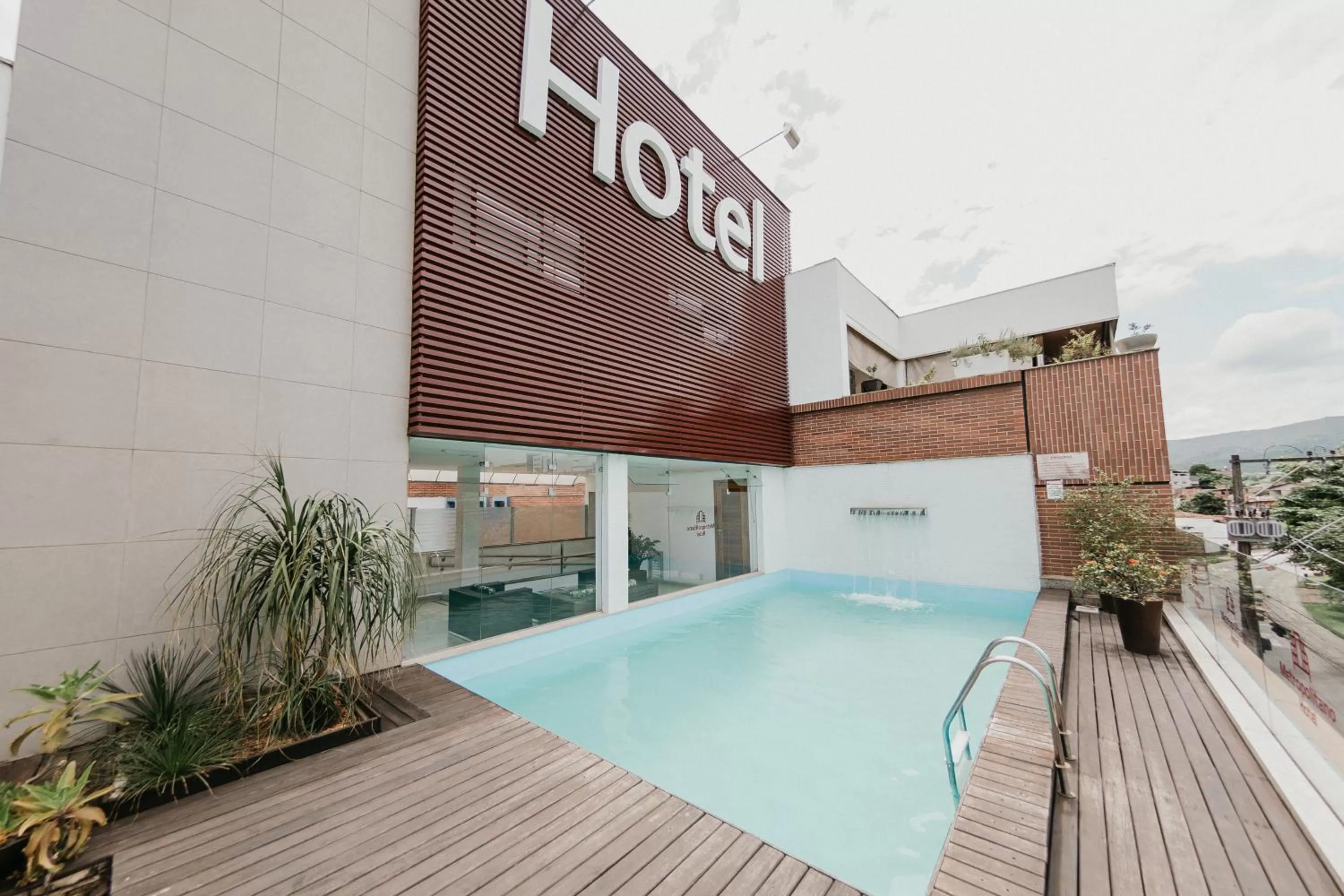 Property logo or sign, Swimming Pool in Hotel Metropolitano