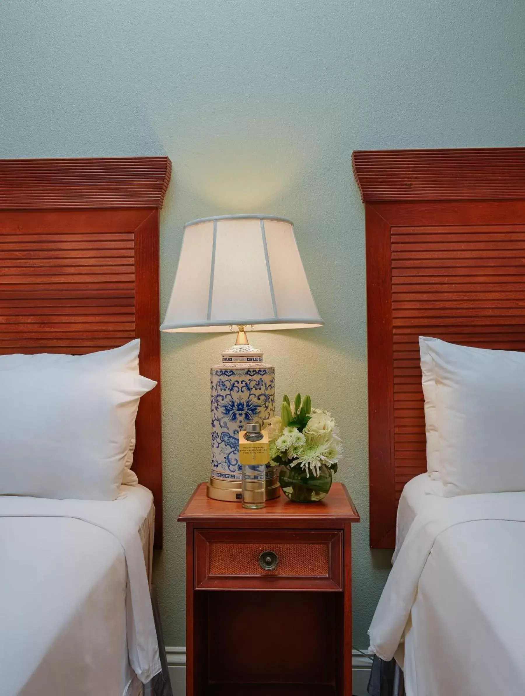 Queen Room with Two Queen Beds and Mobility Accessible Roll-In Shower in voco St James Hotel by IHG Queen Room with Two Queen Beds and Mobility Accessible Roll-In Shower in voco St James Hotel by IHG