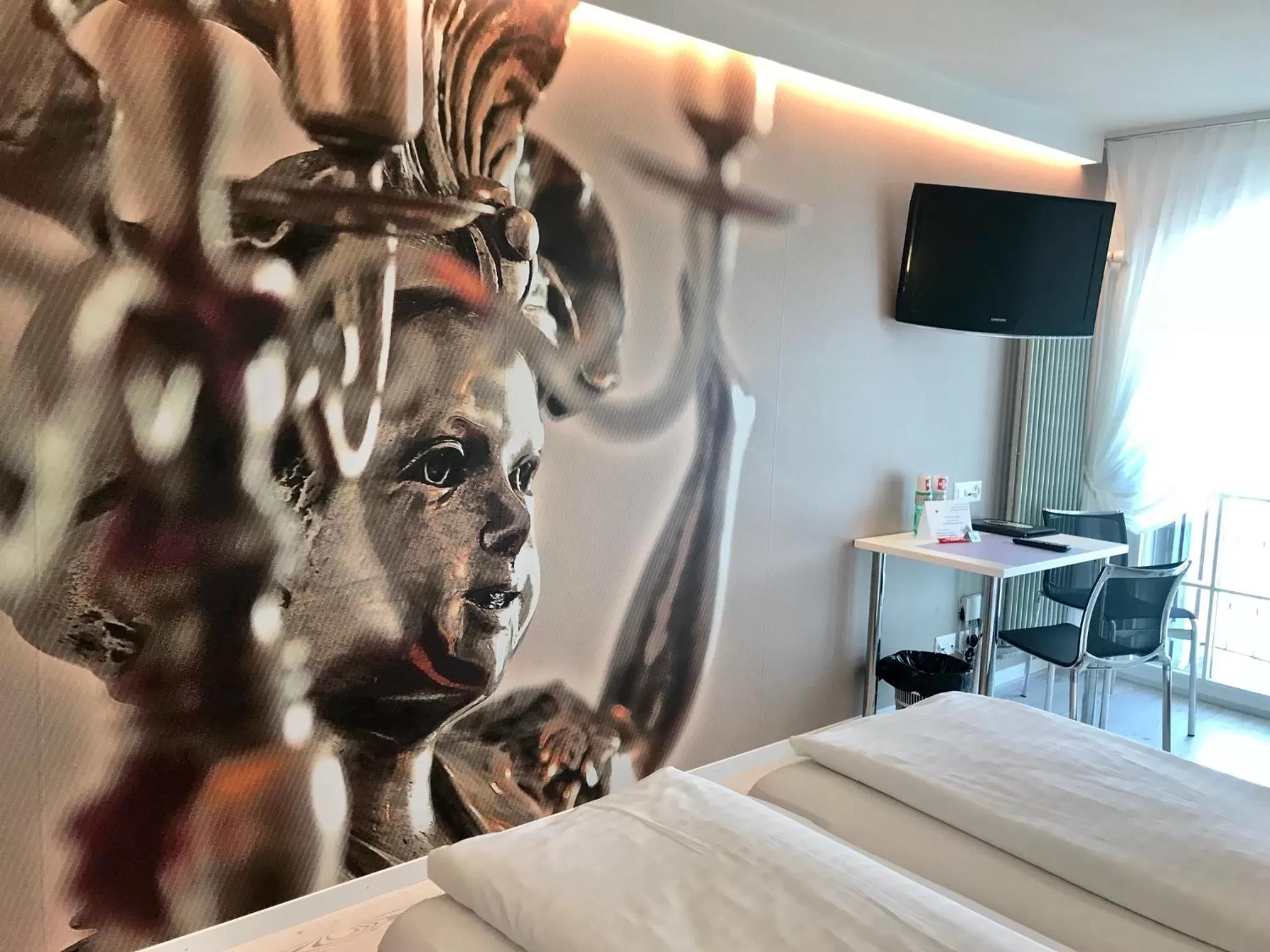 Decorative detail, Bed in Hotel Murtenhof & Krone