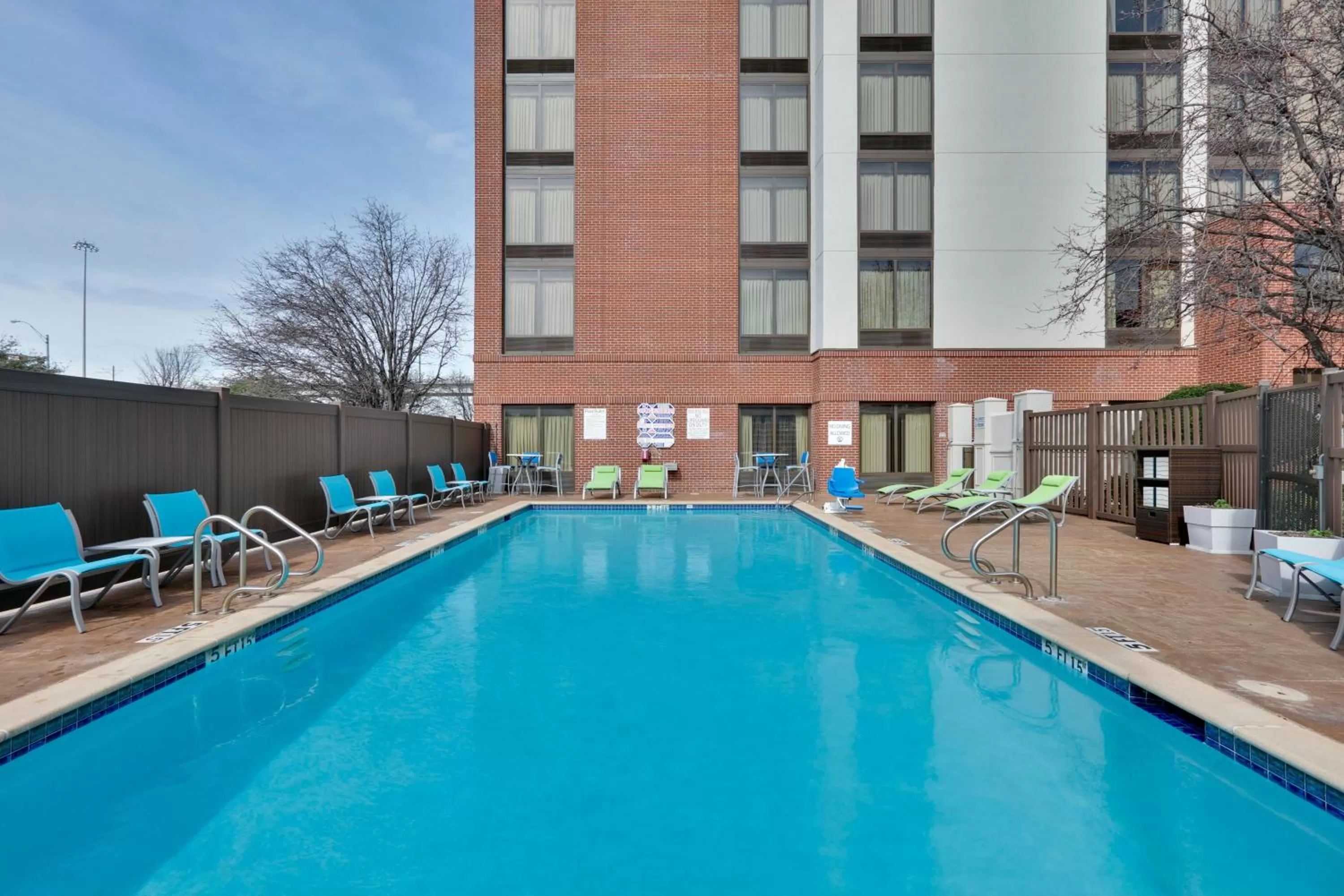 Swimming pool in Holiday Inn Express & Suites Irving Conv Ctr - Las Colinas by IHG