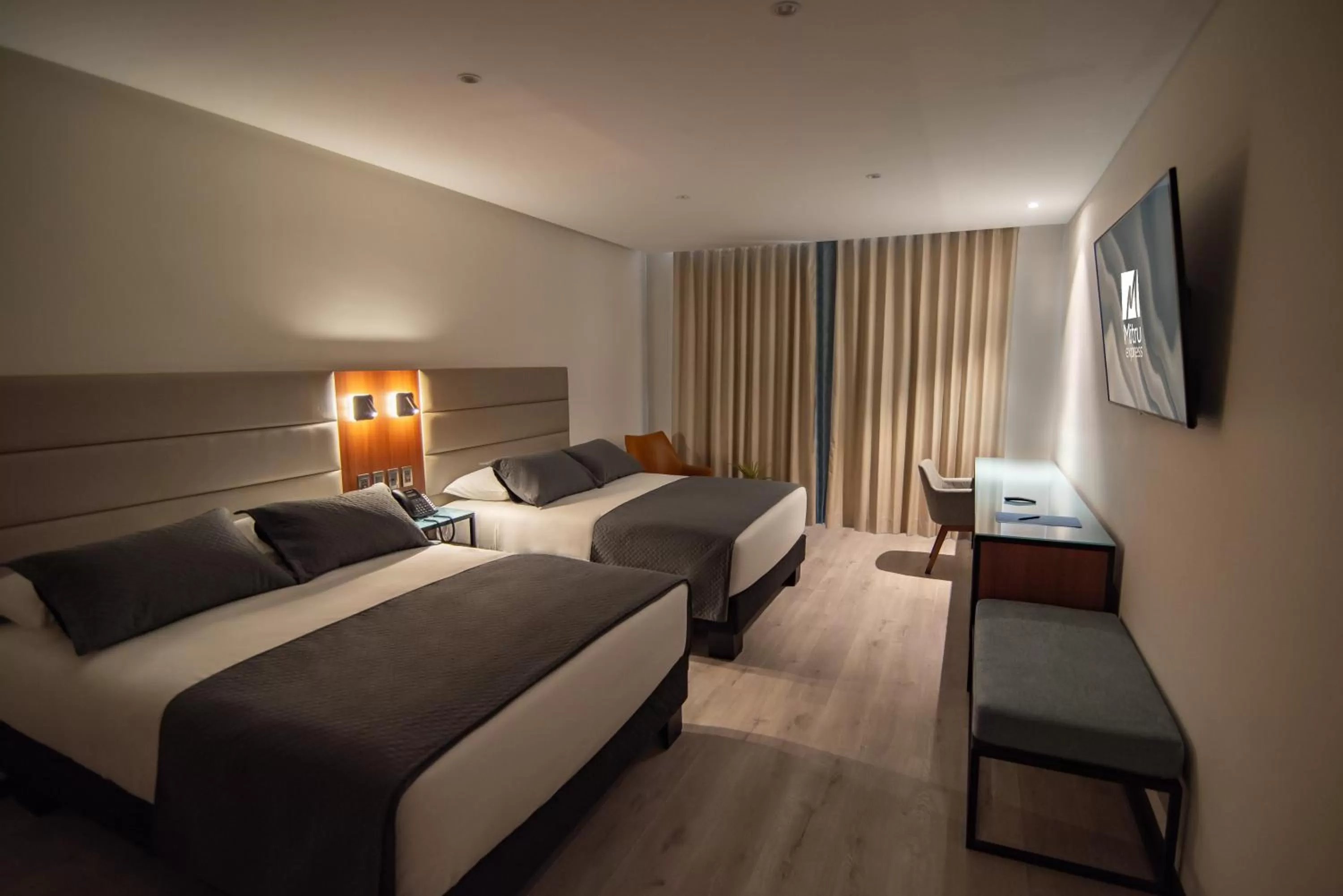 Bed in Mitru Express Hotel