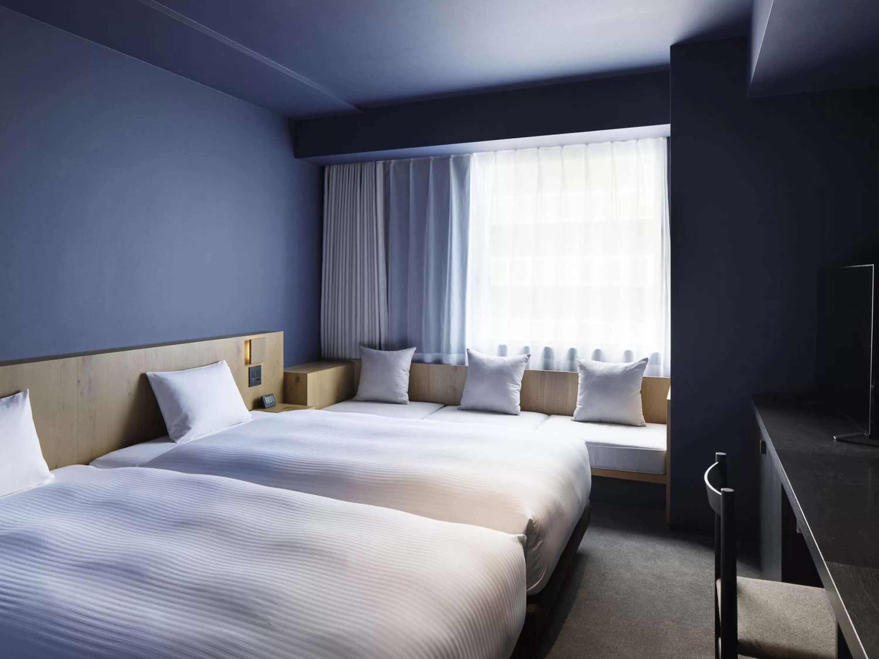 Photo of the whole room, Bed in hotel androoms Sapporo Susukino