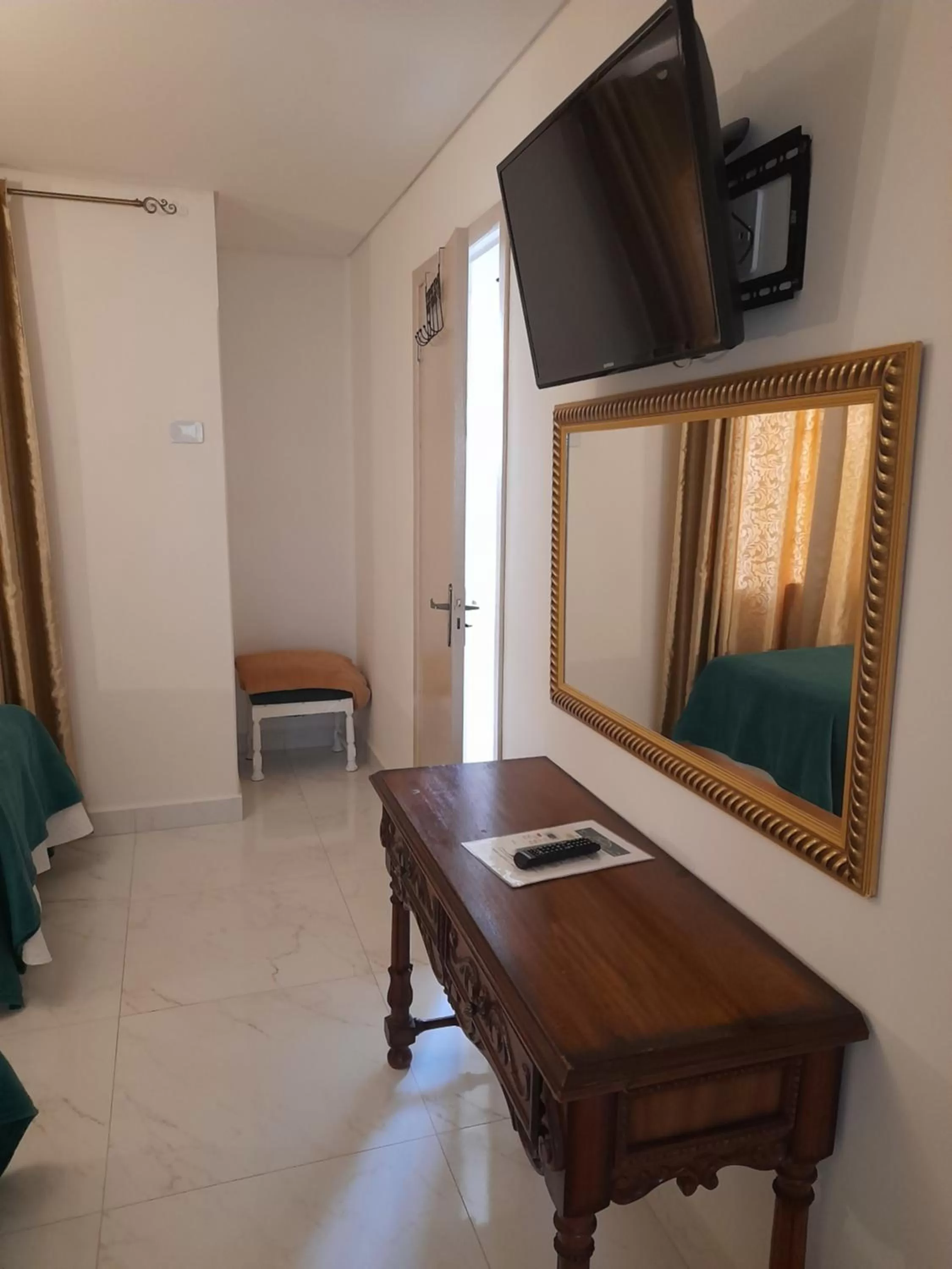 TV/Entertainment Center in La Maison Brasiliana B&B