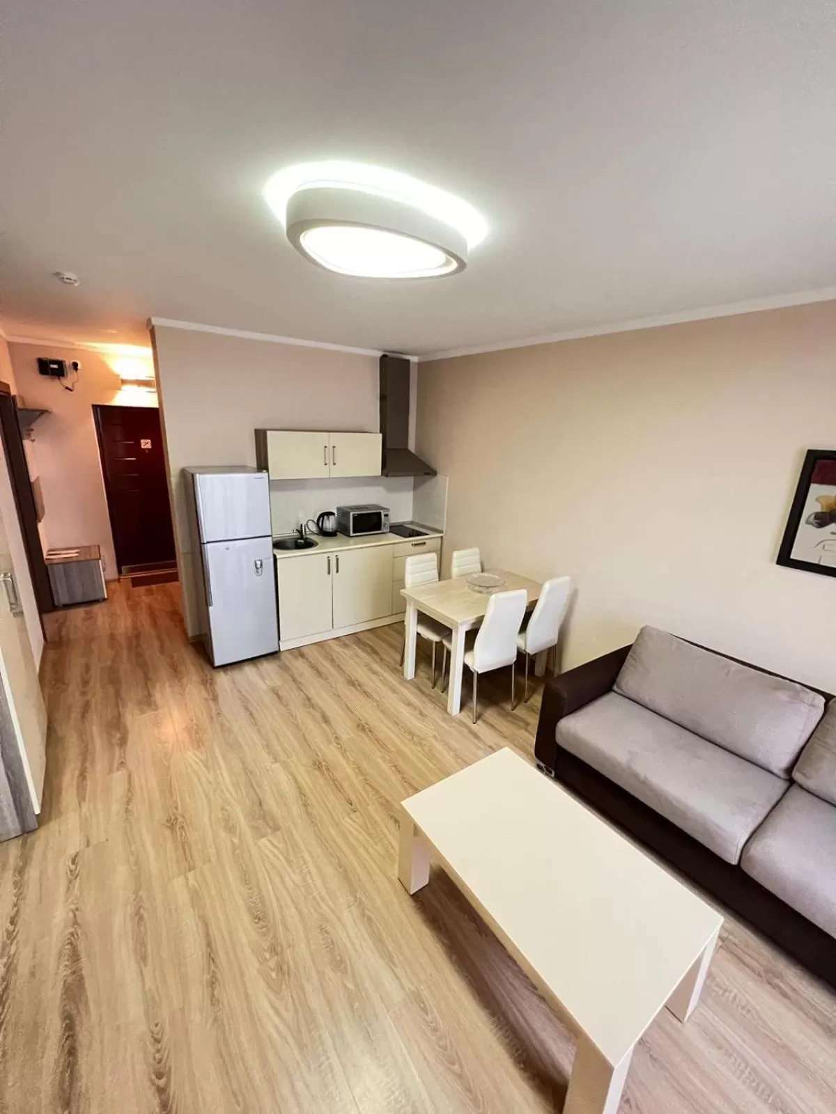 Kitchen or kitchenette, Seating Area in Aparthotel Holiday Lux Batumi