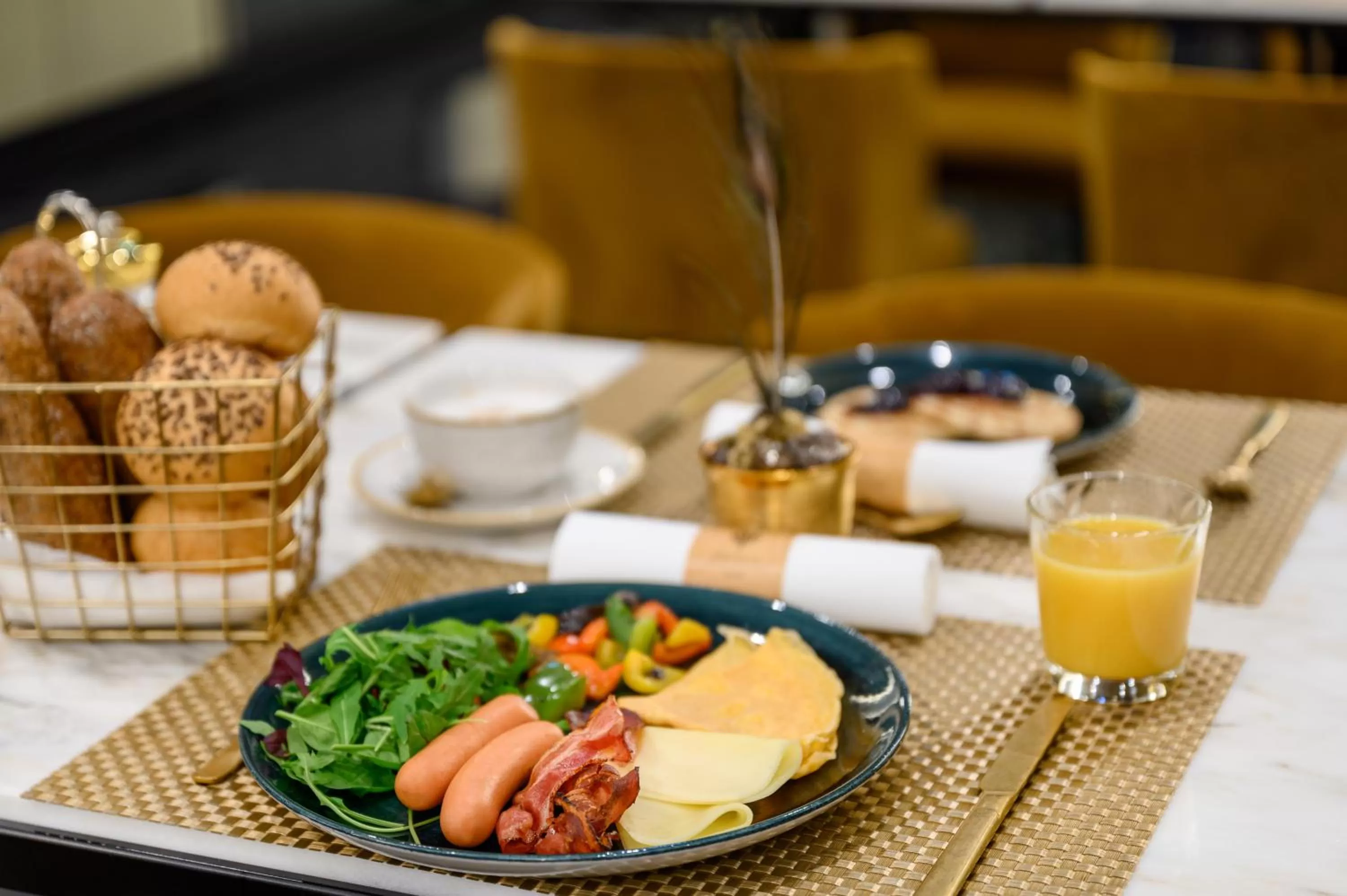 Buffet breakfast in Emerald Downtown Luxury Suites by Continental Group