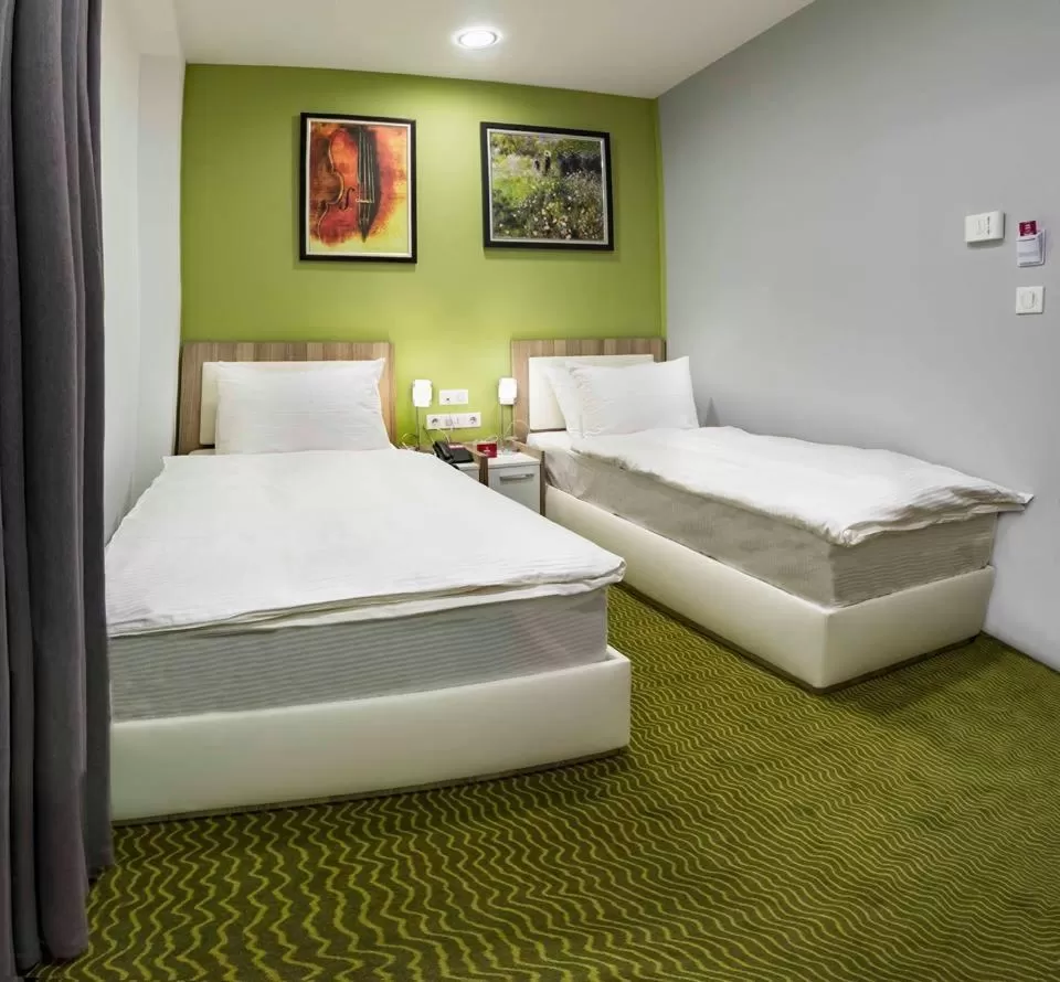 Photo of the whole room, Bed in Central Hotel, Fitness and Spa