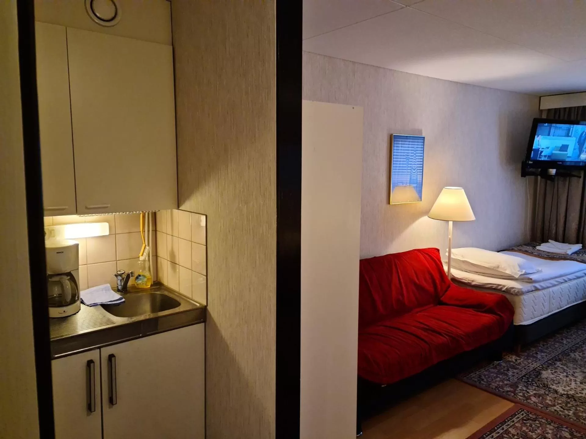 Kitchen/Kitchenette in Hotelli Sandels