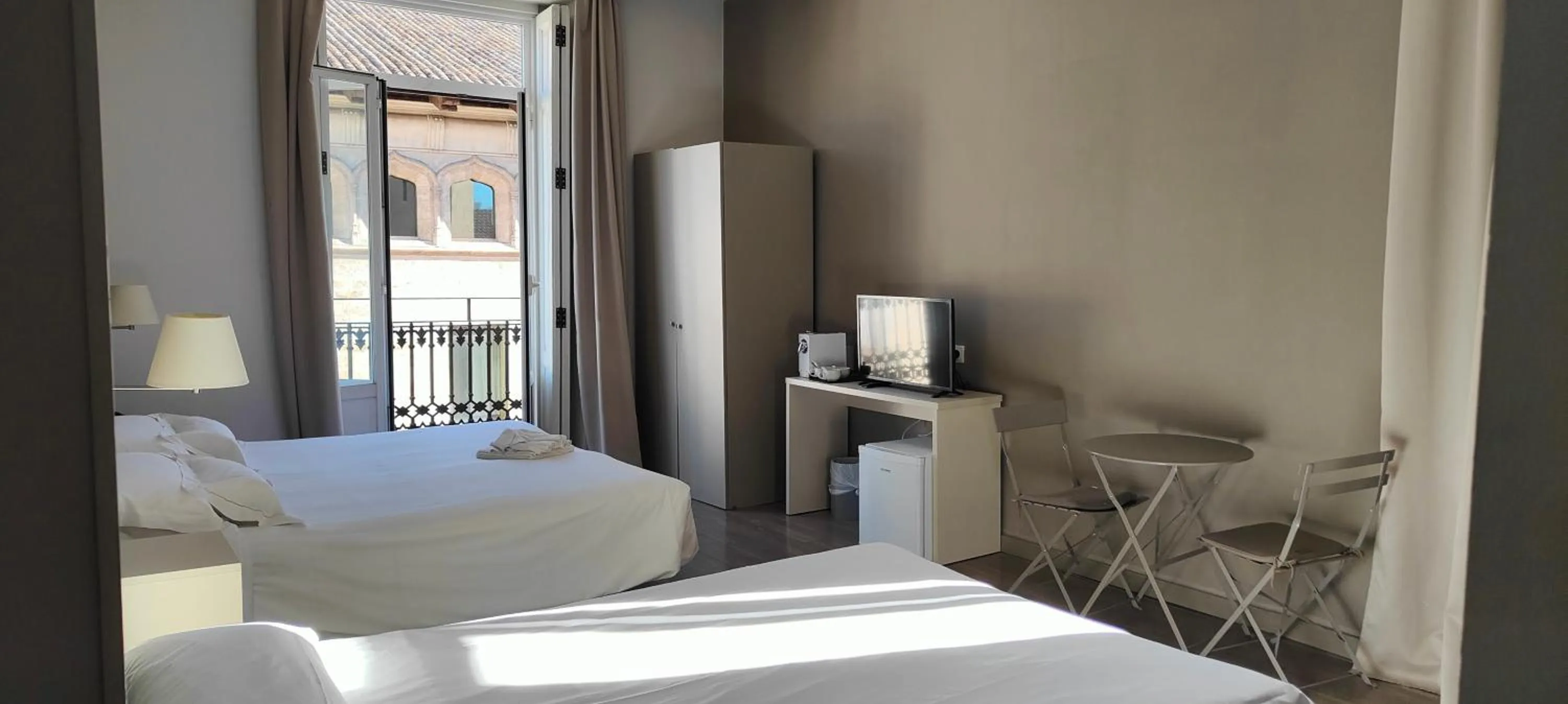 Bed in Hotel San Lorenzo Boutique Plaza