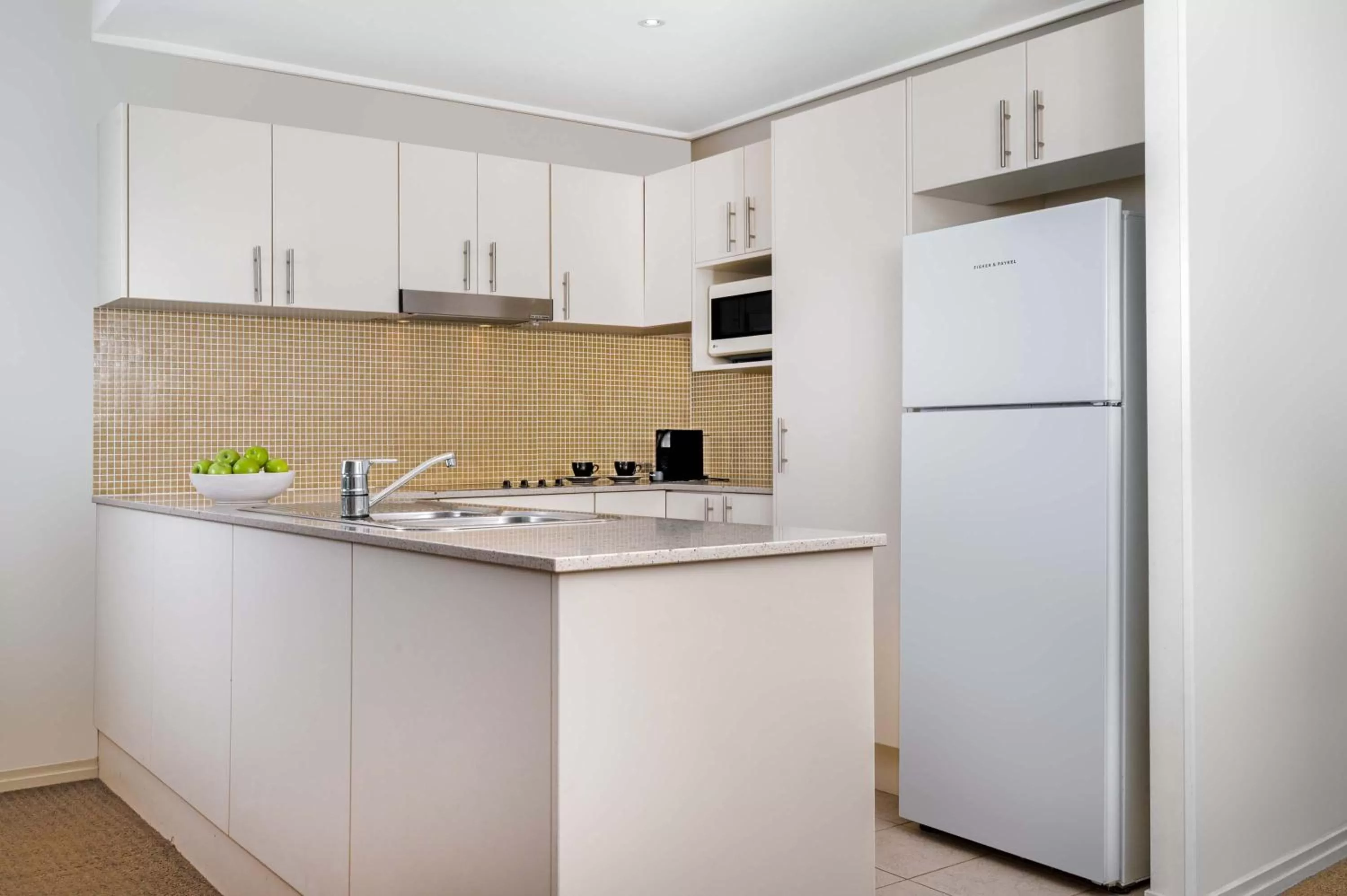 kitchen in Mantra The Observatory