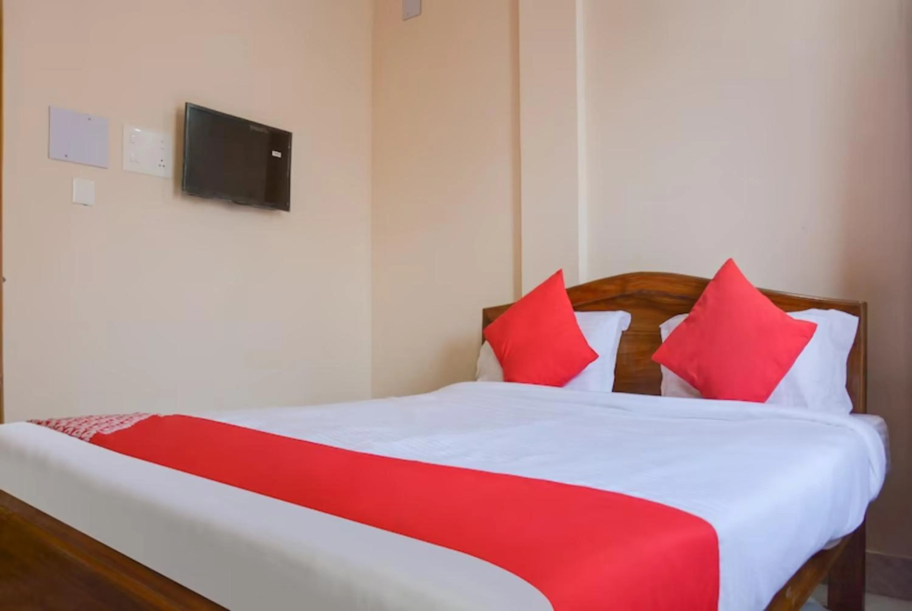 Bed in Goroomgo Caroline Homestay Bhubaneswar