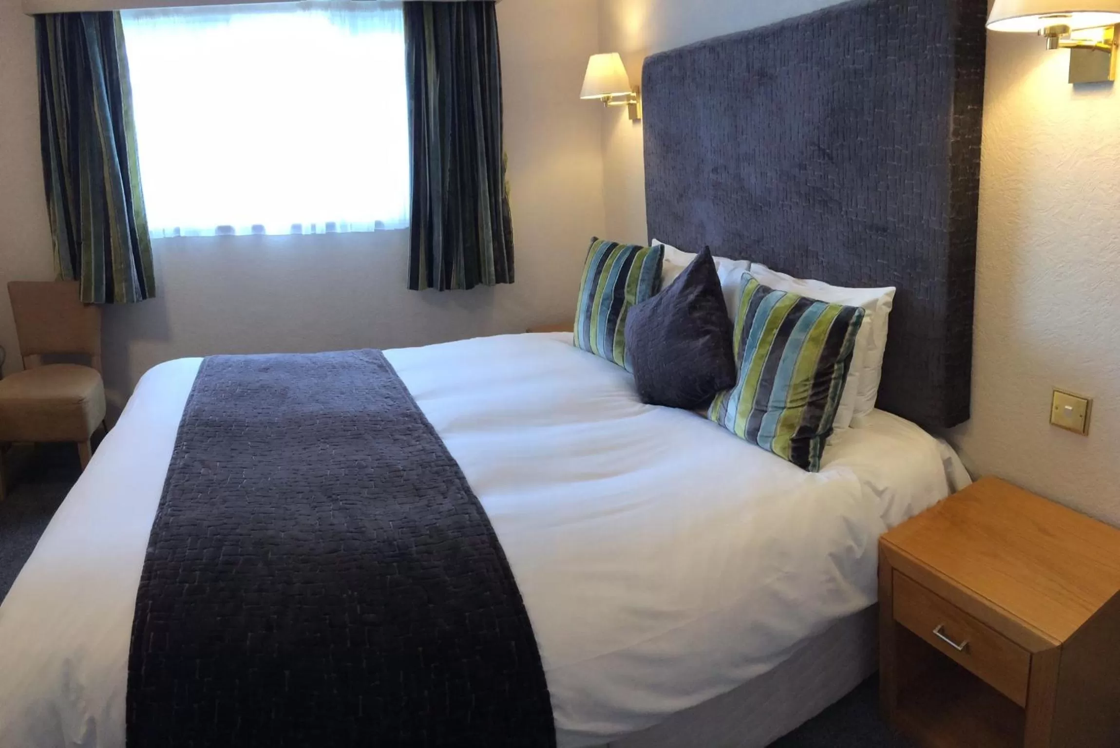 Shower, Bed in Falcon Hotel