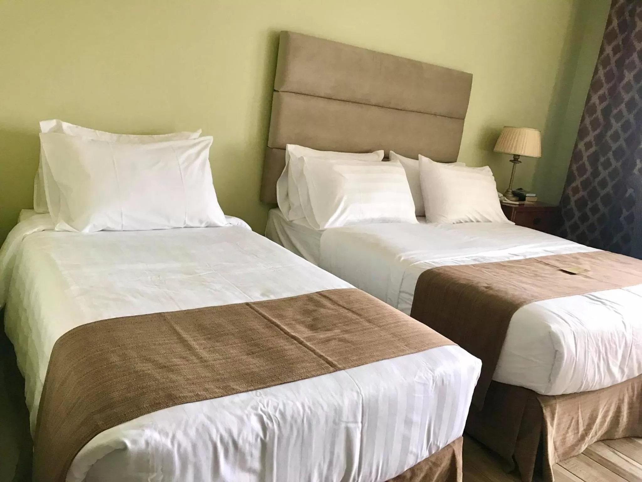 Bed in Skyland Garden Hotel and Resort