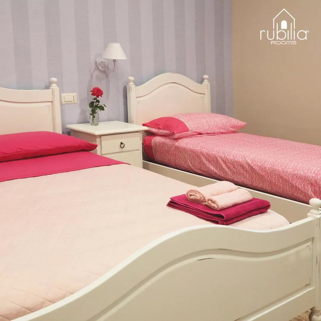 Bed in Rubilia Rooms Pompei