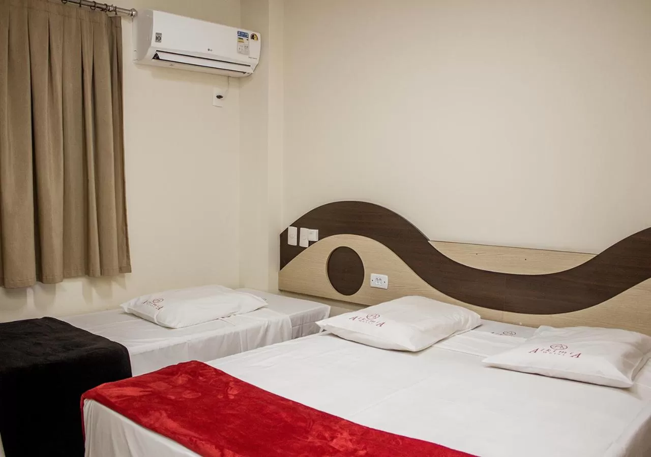 Bed in Alkimia Hotel