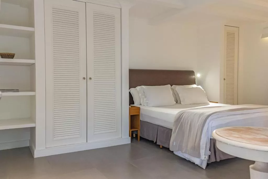 Bed in Felissimo Exclusive Hotel