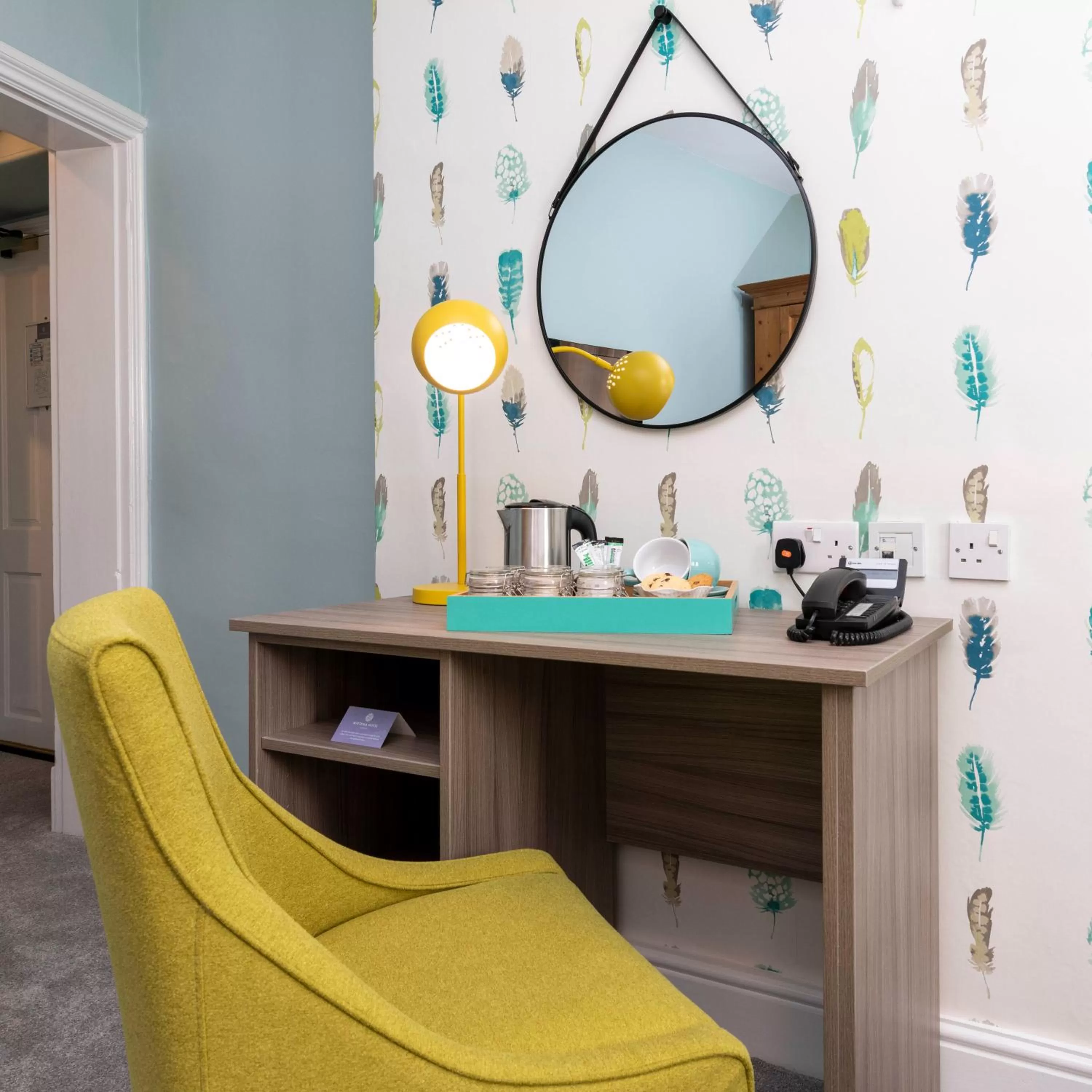 Coffee/tea facilities in Wisteria Hotel