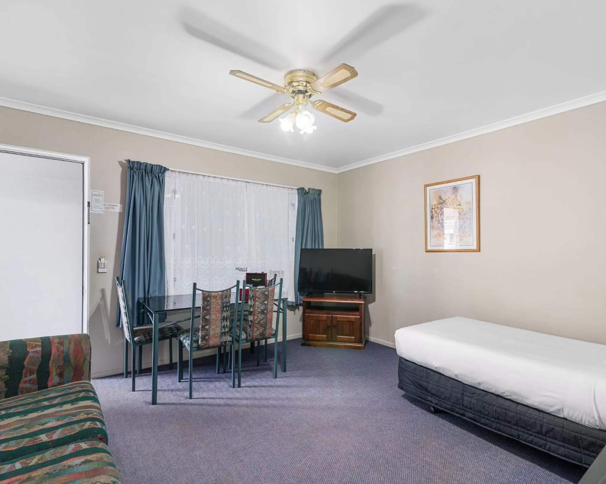 Living room, TV/Entertainment Center in ASURE PRINCE motor lodge