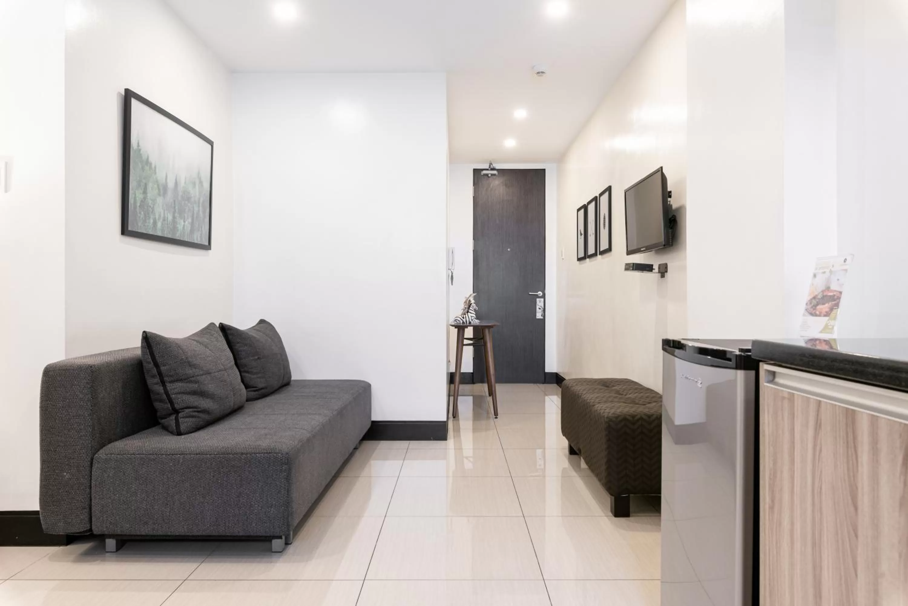 Living room in Artemis Place Makati Hotel