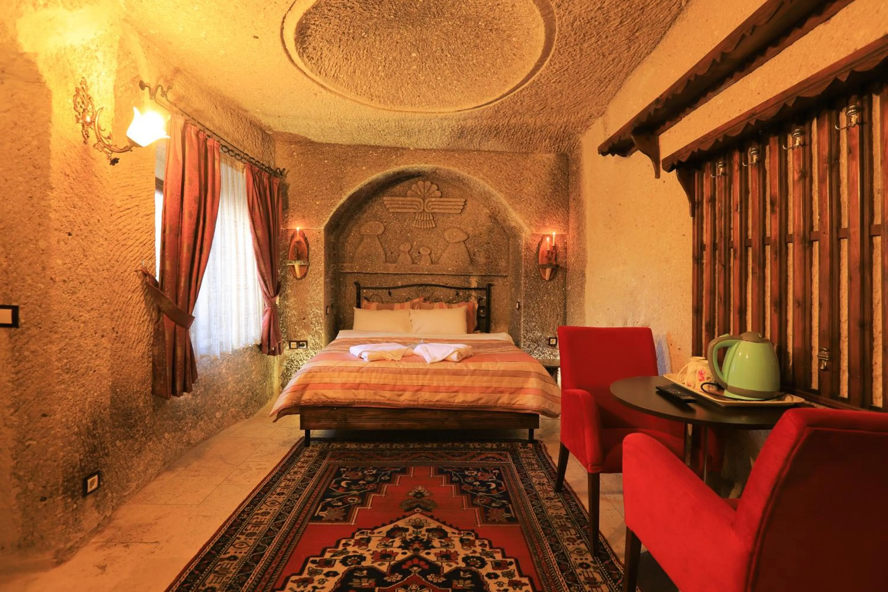 Property building, Bed in Antique Terrace Cave Suites
