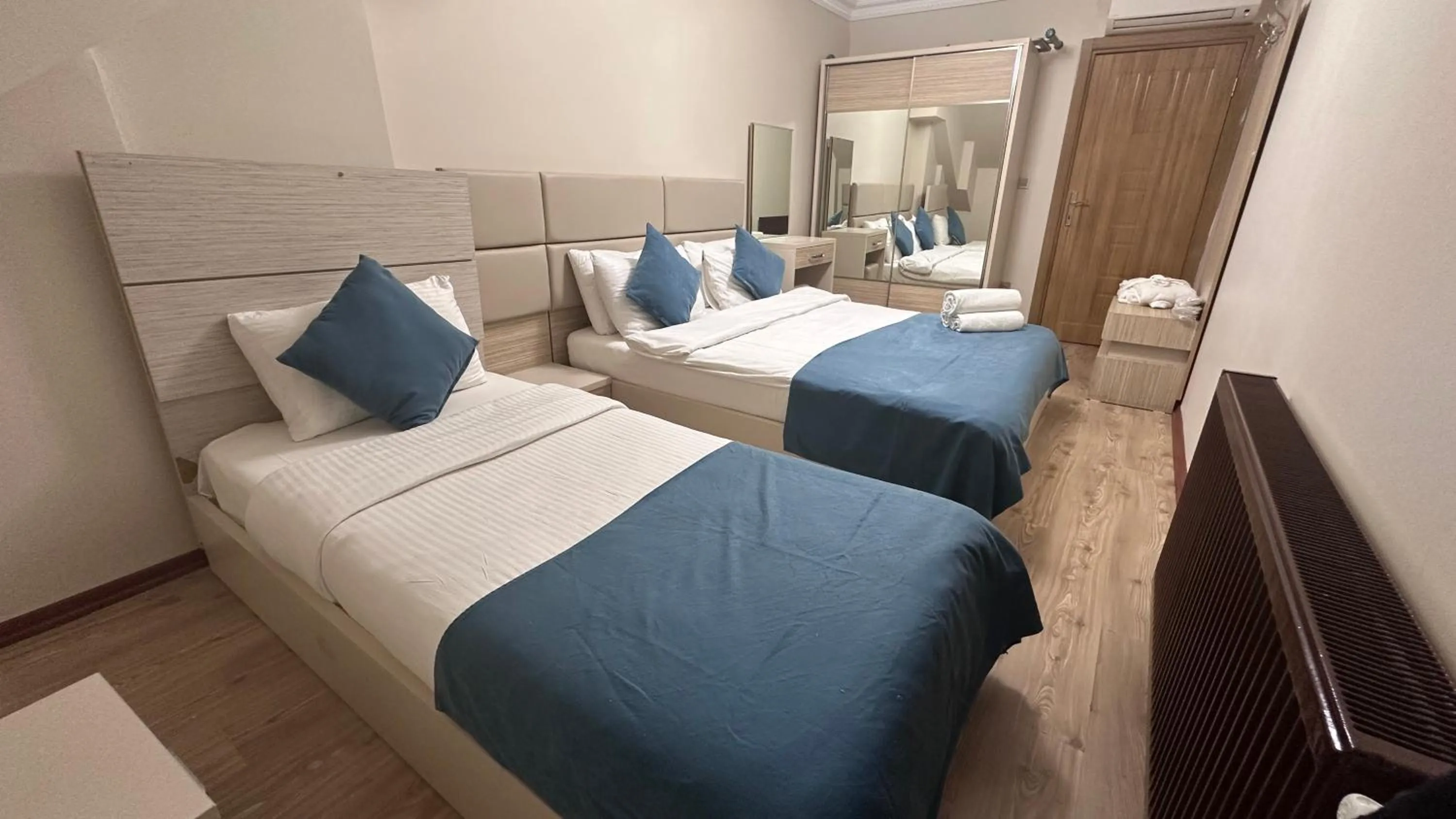 Bed in Overland Residence