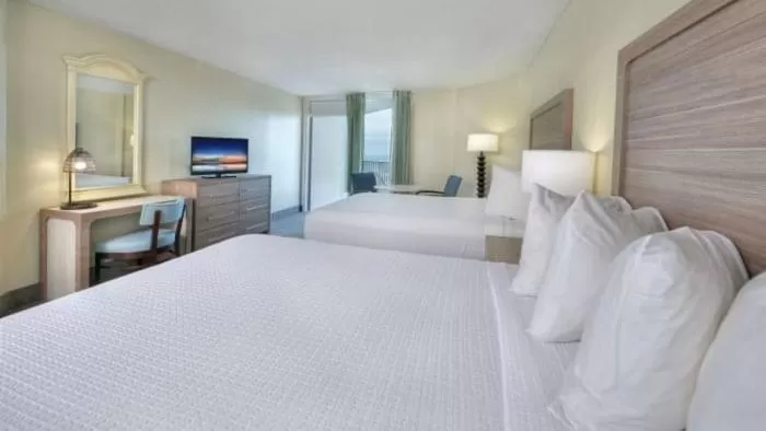 Bedroom, Bed in El Caribe Resort and Conference Center