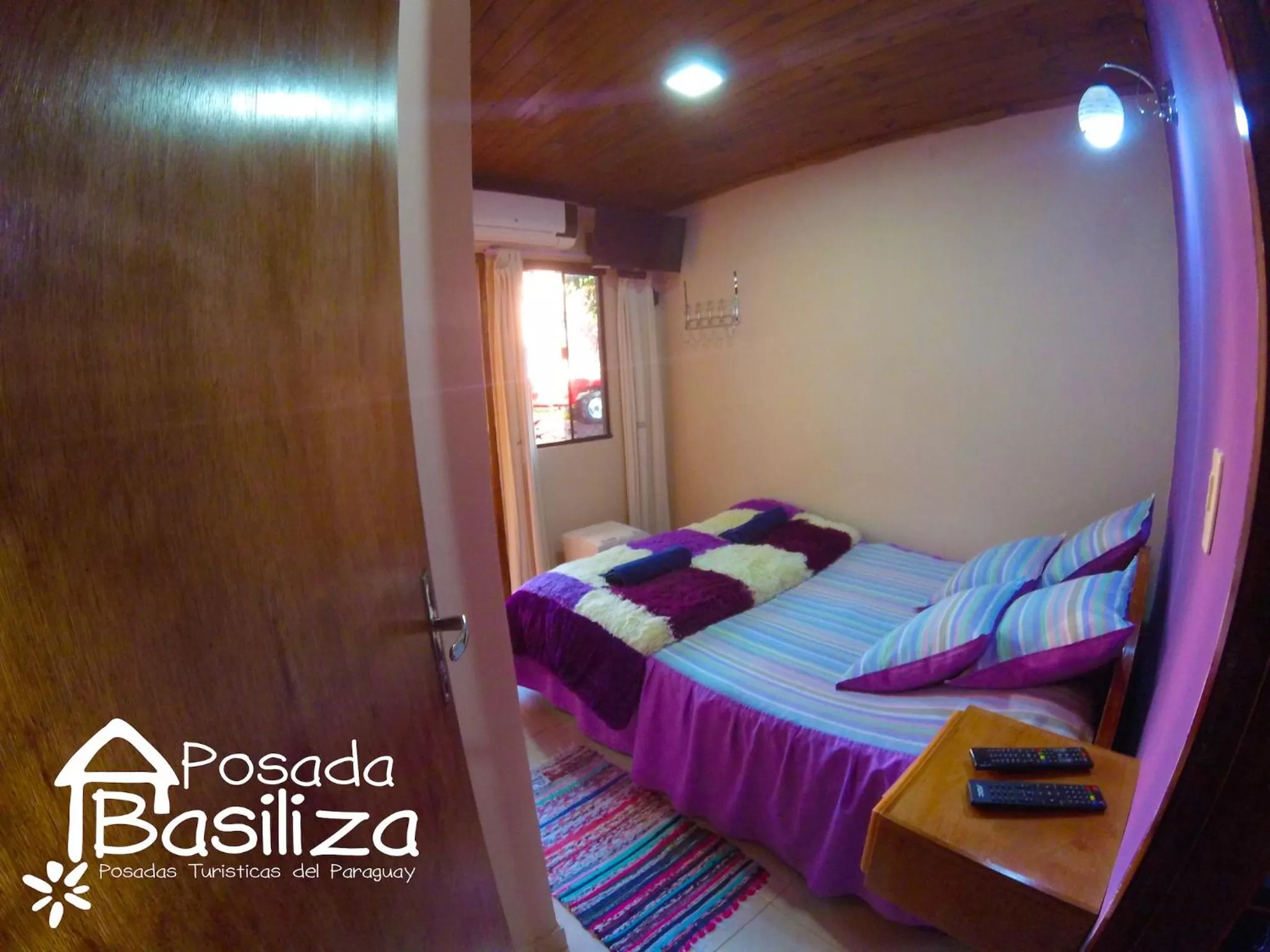 Photo of the whole room, Bed in Posada Basiliza, Encarnación PY