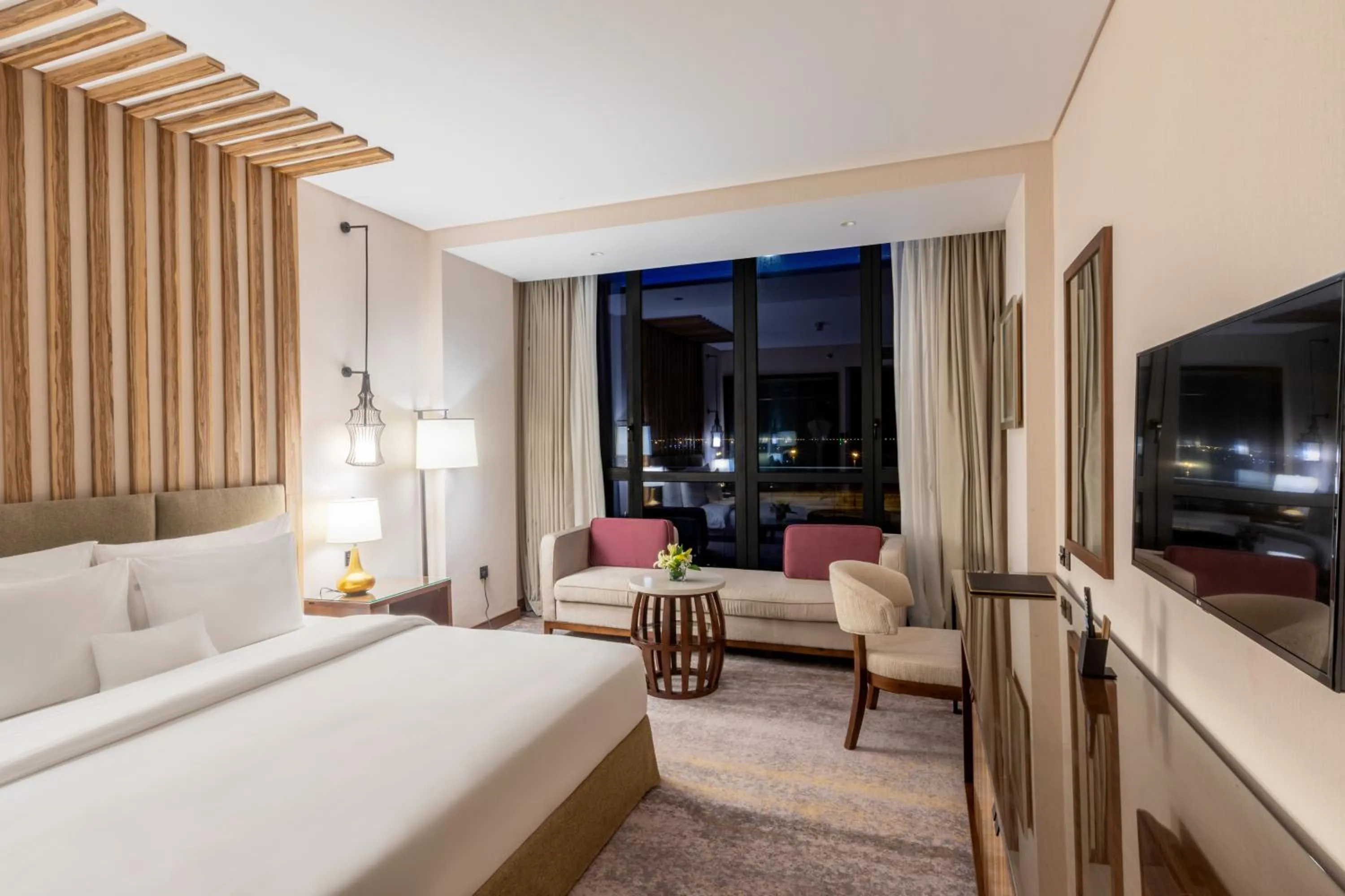 Bedroom, Bed in Millennium Resort Salalah