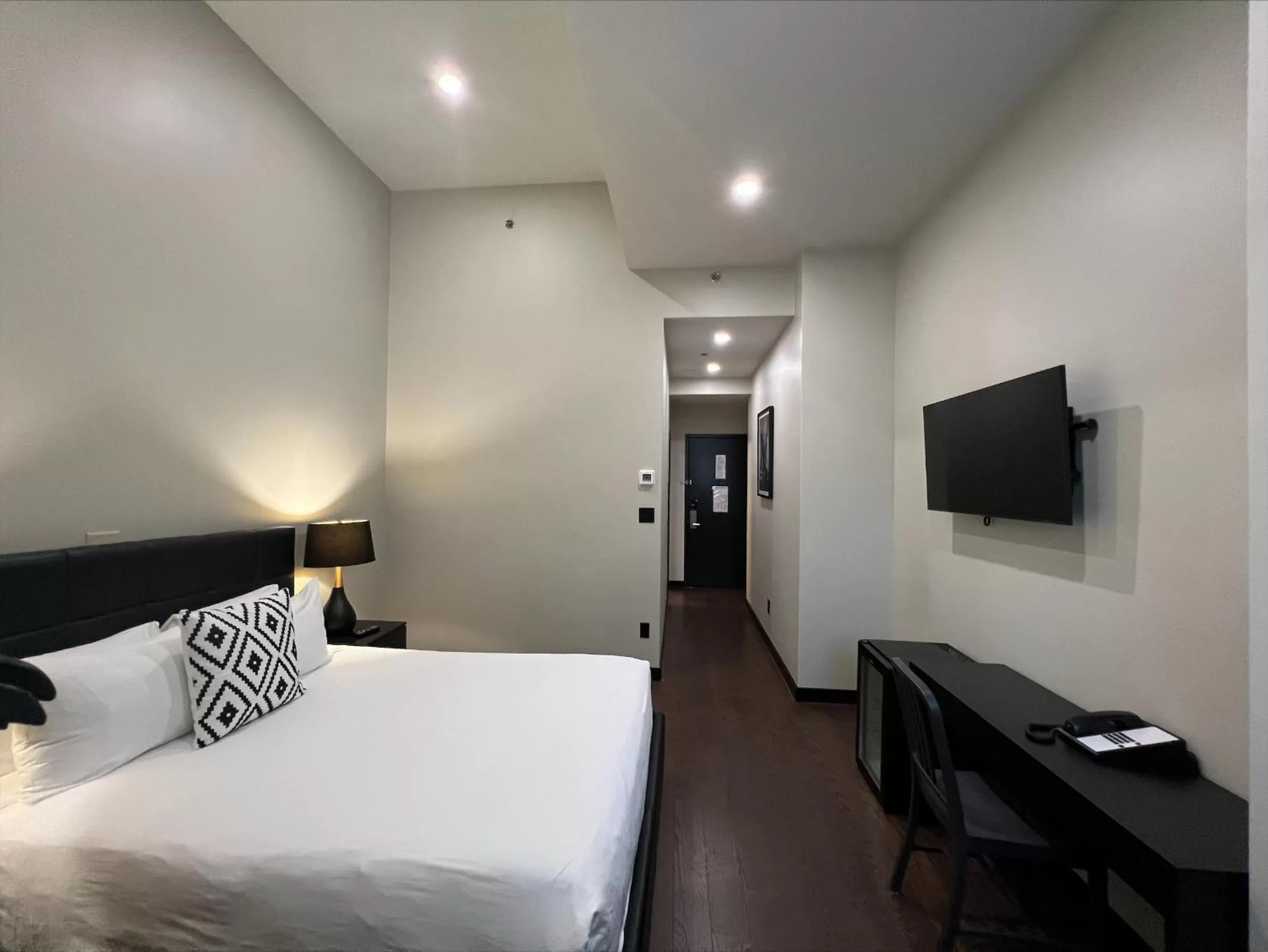 Bed in Cachet Boutique Hotel NYC