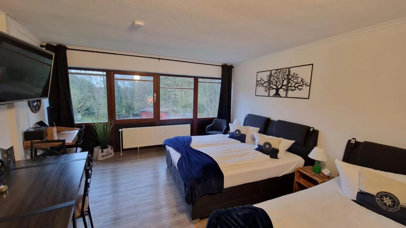 Photo of the whole room, Bed in Hotel Seeblick am Sankelmarker See - Natur und Erholung