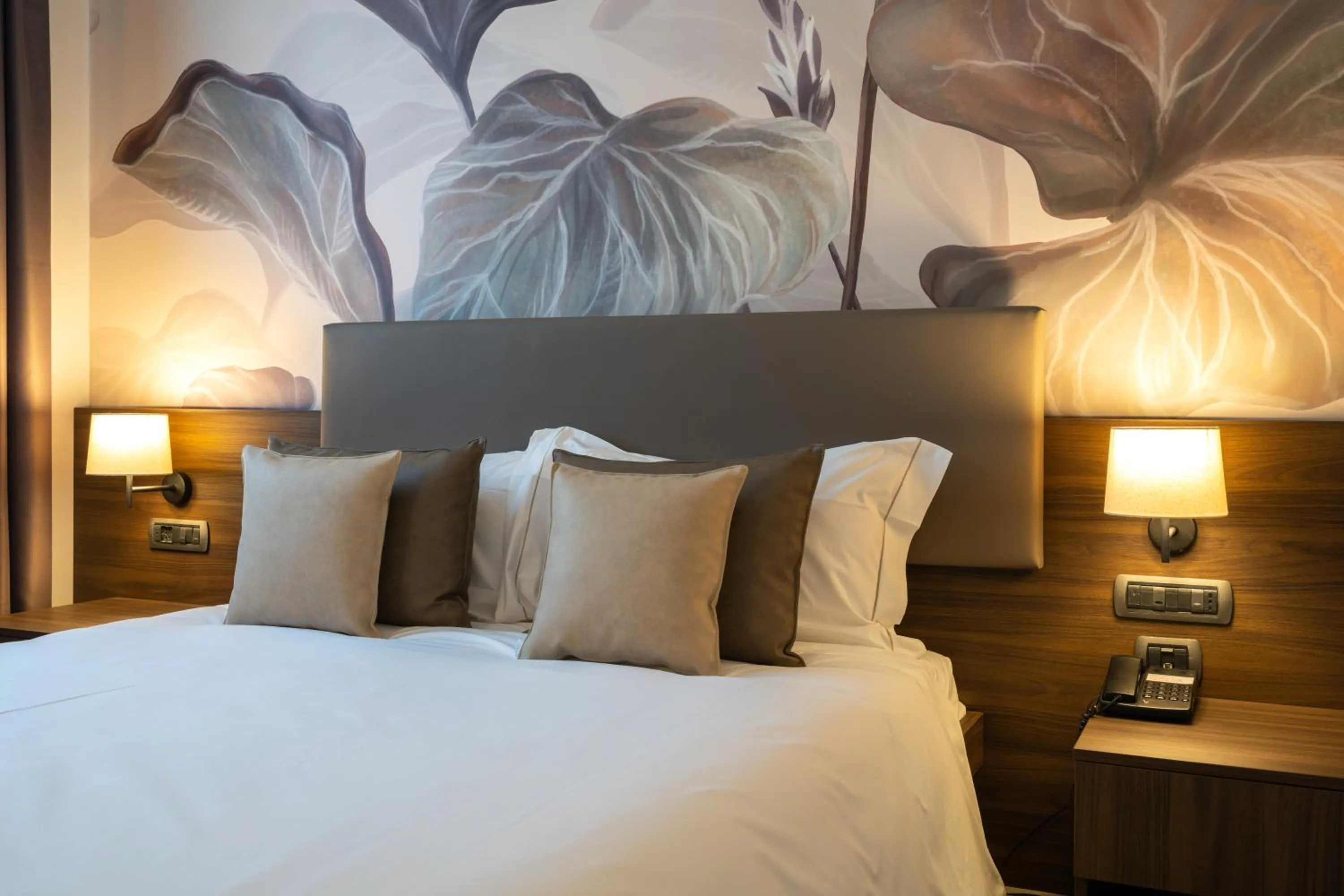 Bed in Ulivi Hotel & Residence