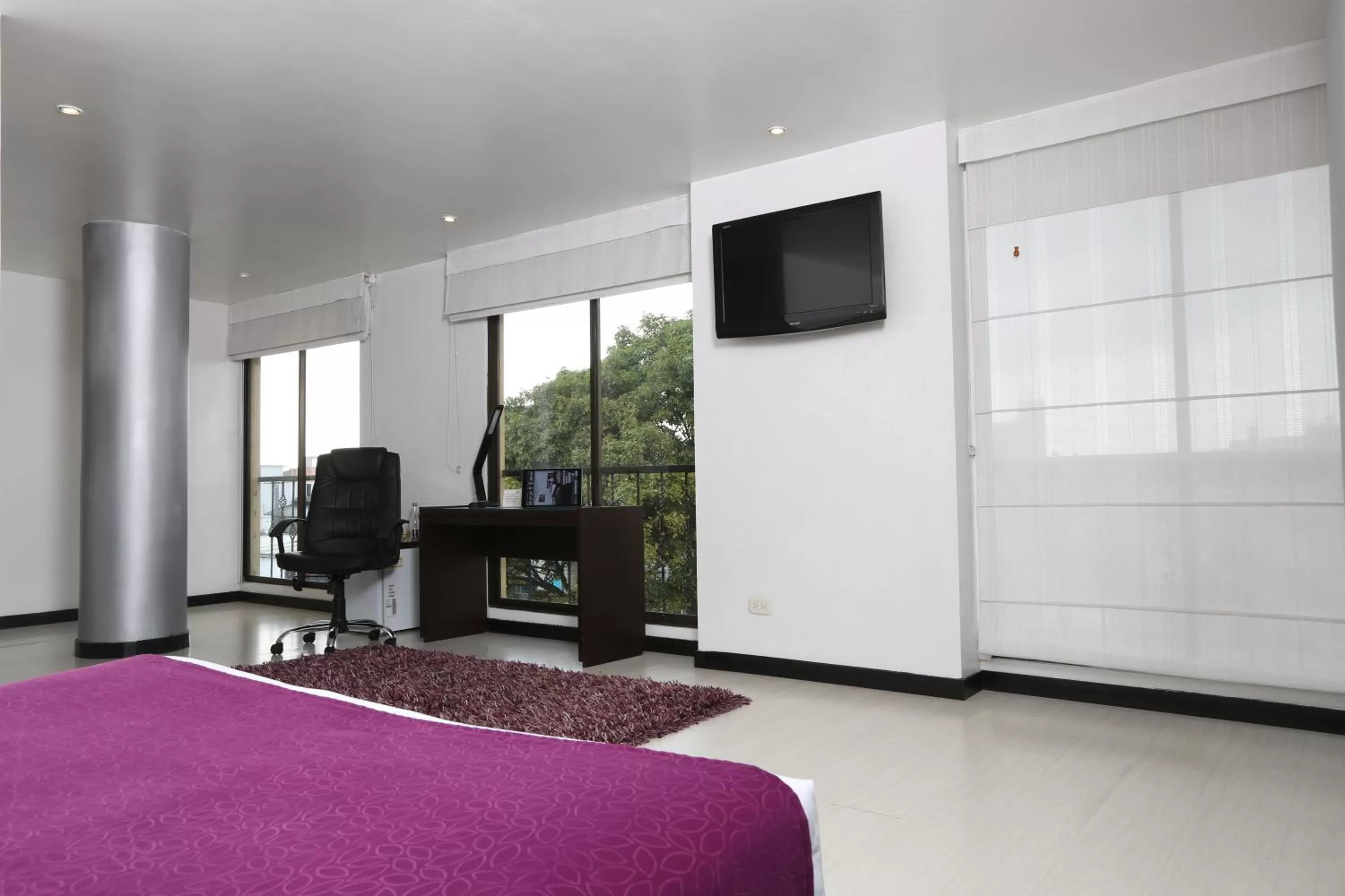 Photo of the whole room, TV/Entertainment Center in Suites 109 GH Usaquén