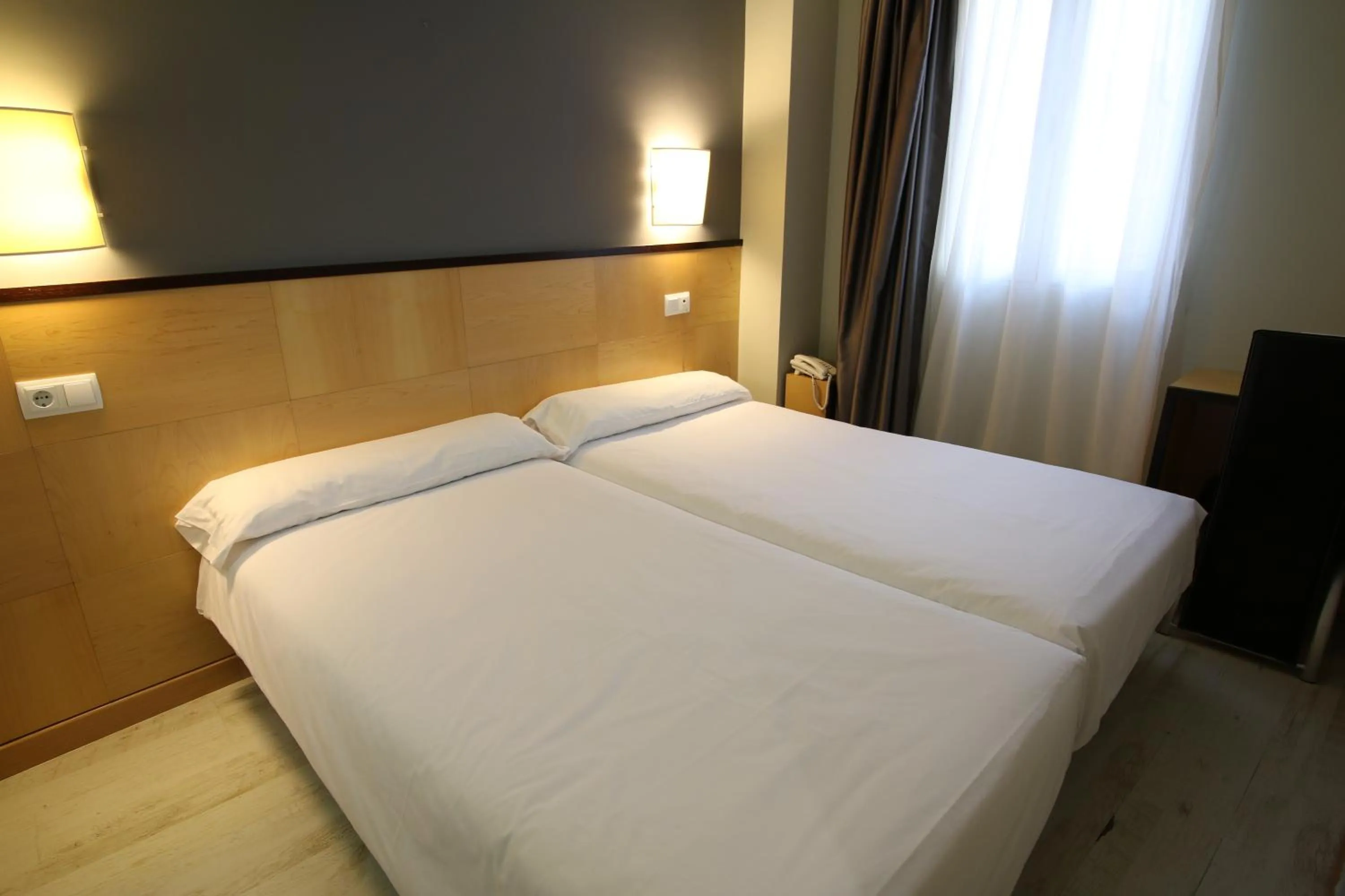 Bed in Hotel Alda Entrearcos