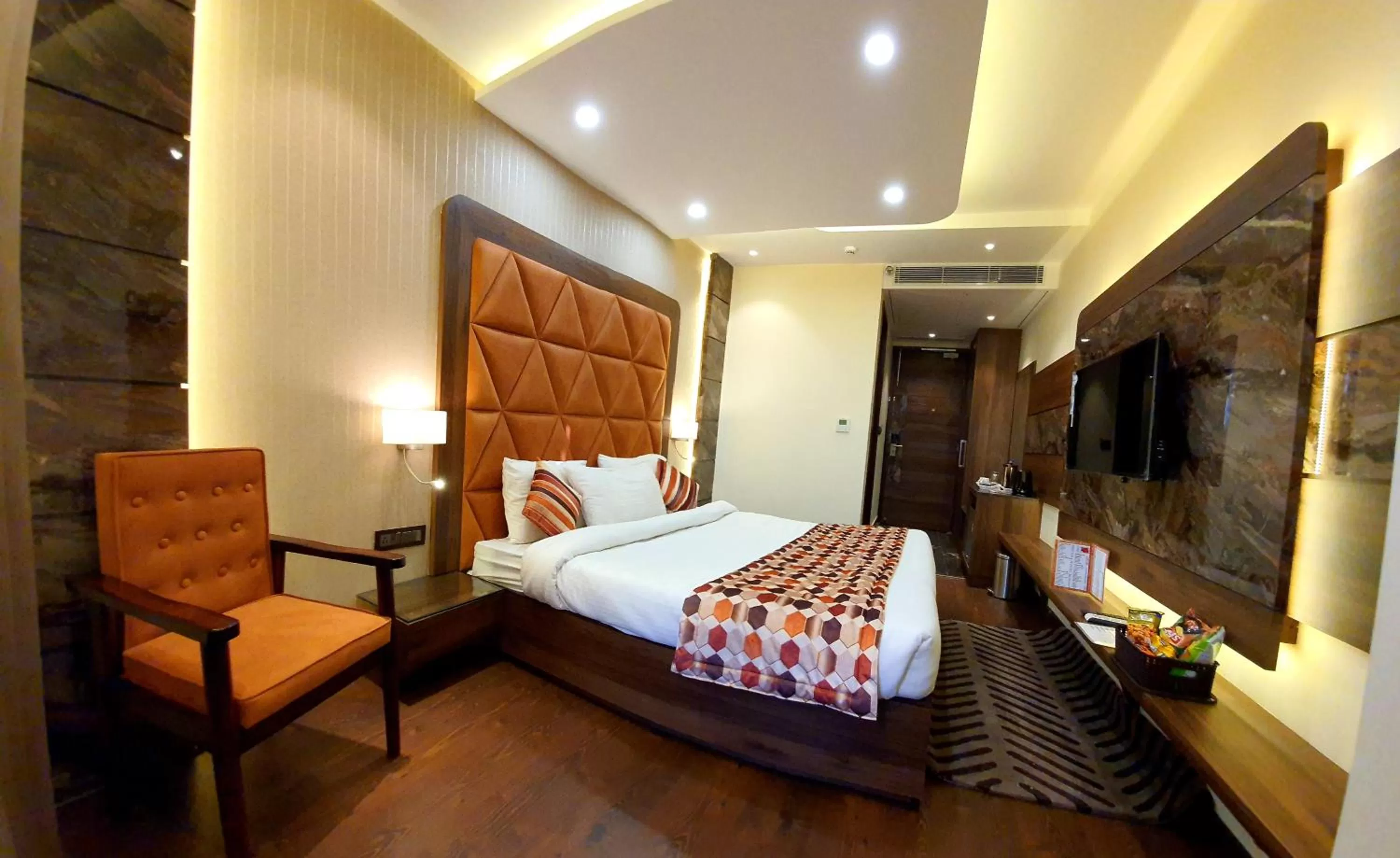 Bed in Hotel Makhan Residency