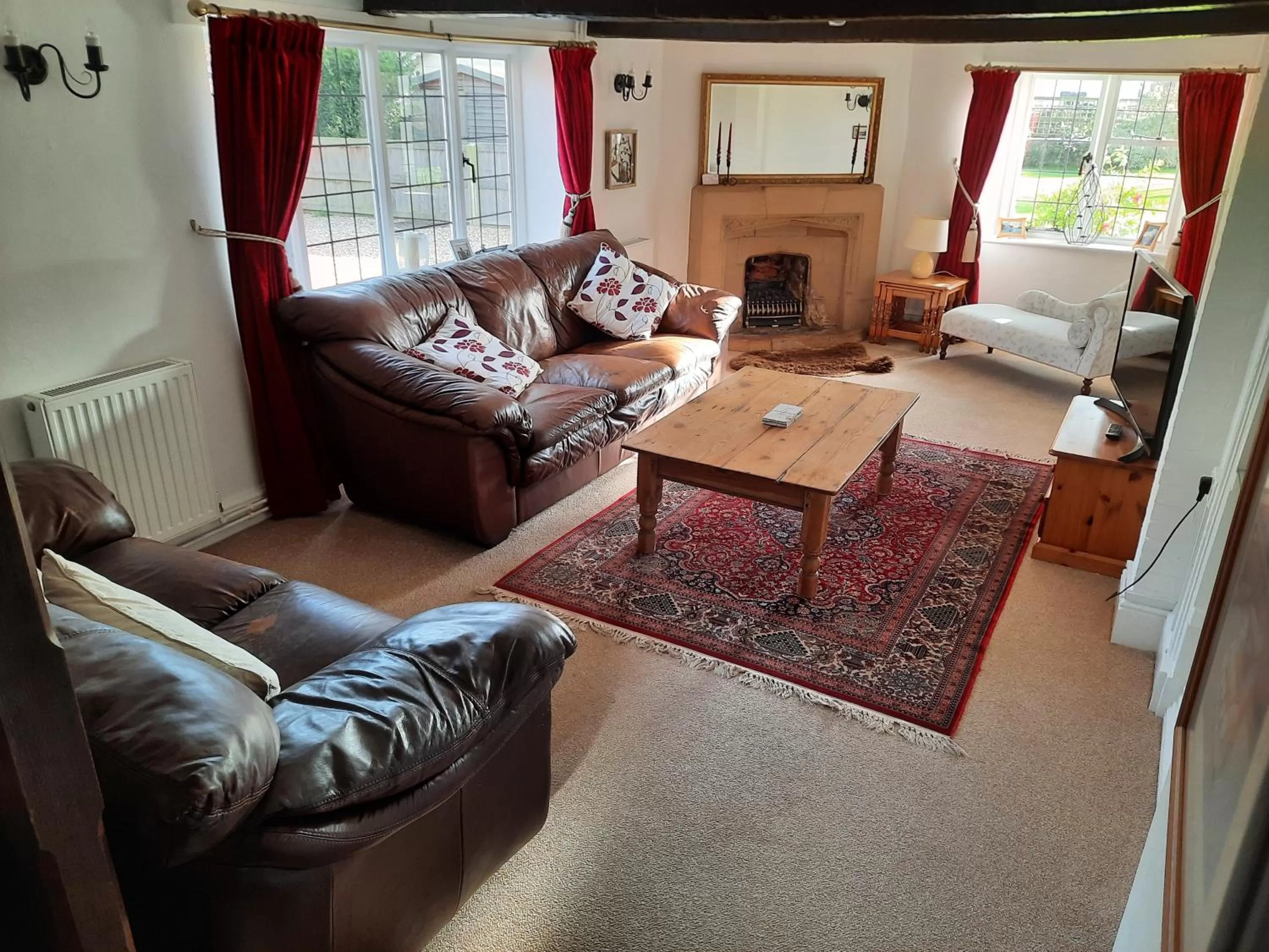 Communal lounge/ TV room in The White Cottage