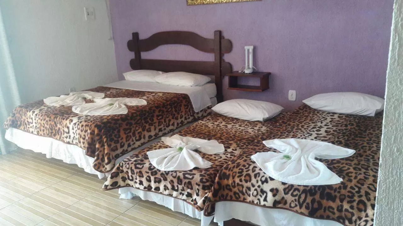 Bed in Pousada da Praia