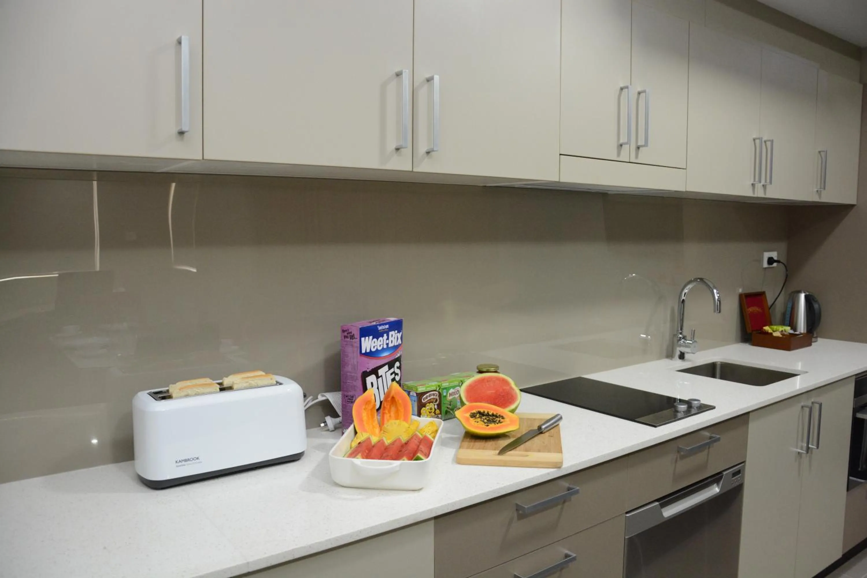 Kitchen or kitchenette in Ratsun Nadi Airport Apartment Hotel