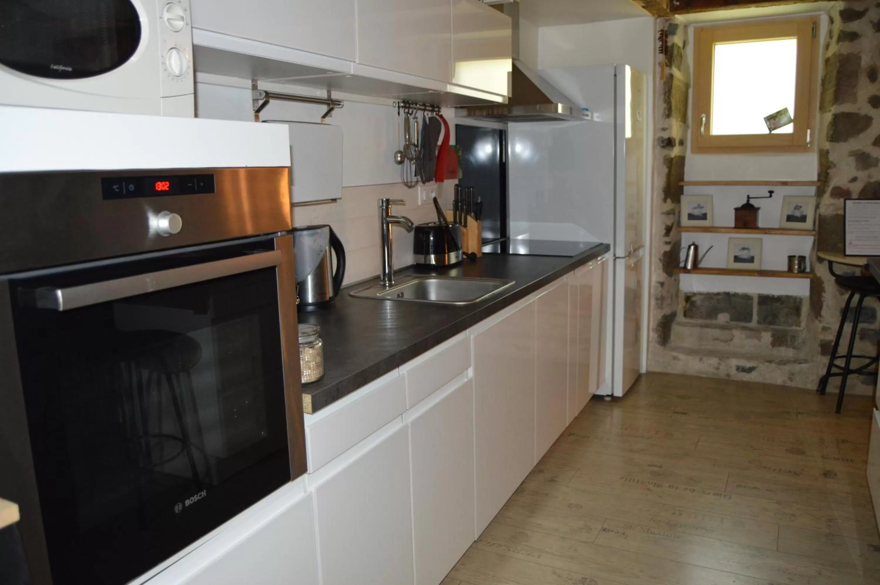 Communal kitchen in Le gîte du Bessat