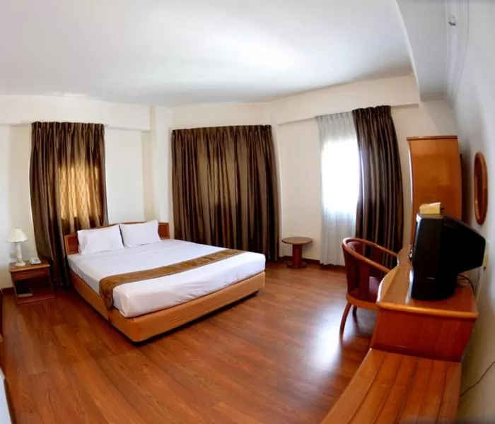 Bed in Kawan Hotel