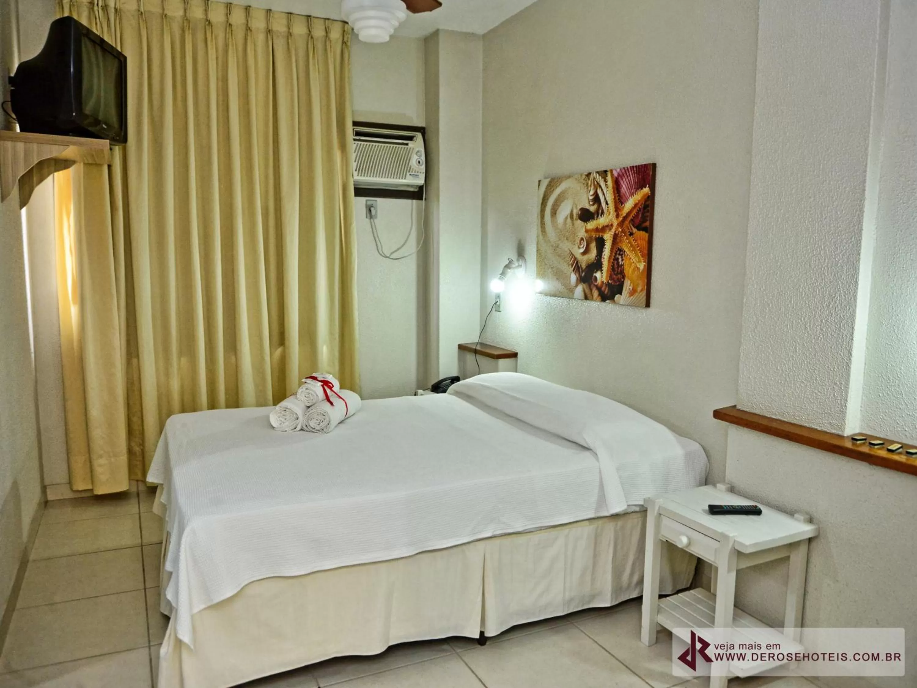 Bed in De Rose Palace Hotel