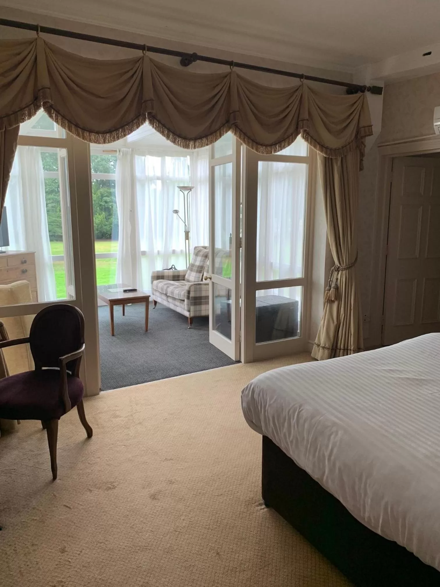 Seating area, Bed in Flitwick Manor Hotel