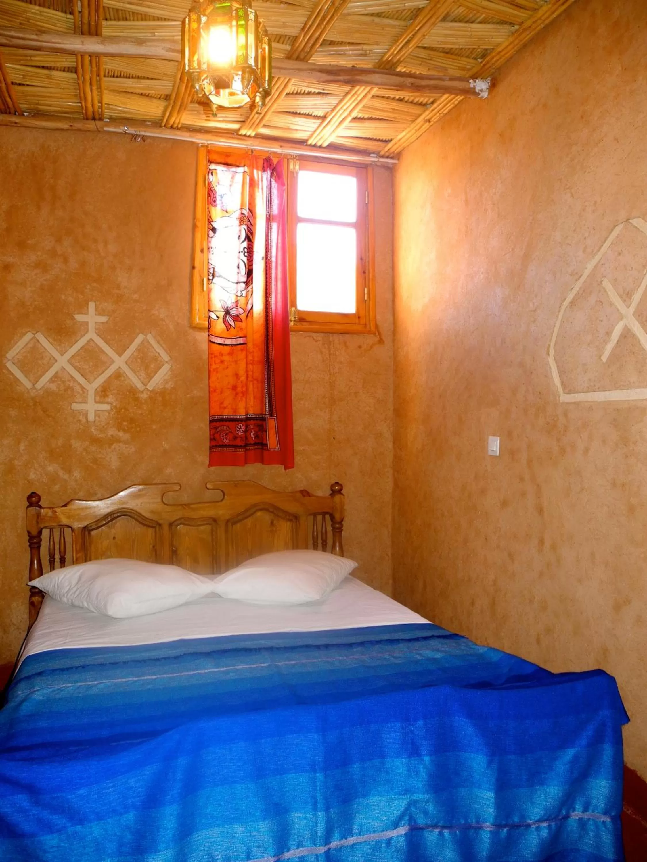 Bed in Maison d'Hôte Valentine