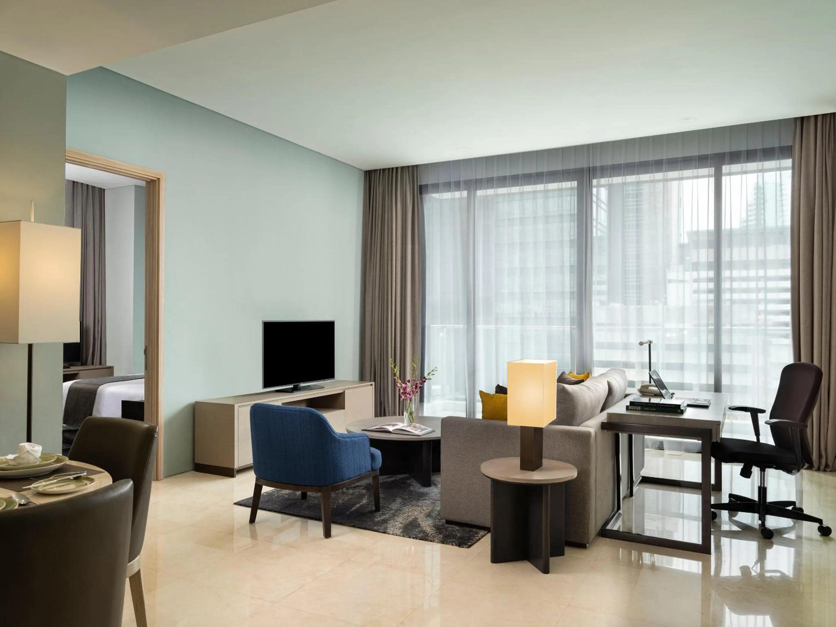 Living room, Seating Area in Crowne Plaza Jakarta Residences, an IHG Hotel
